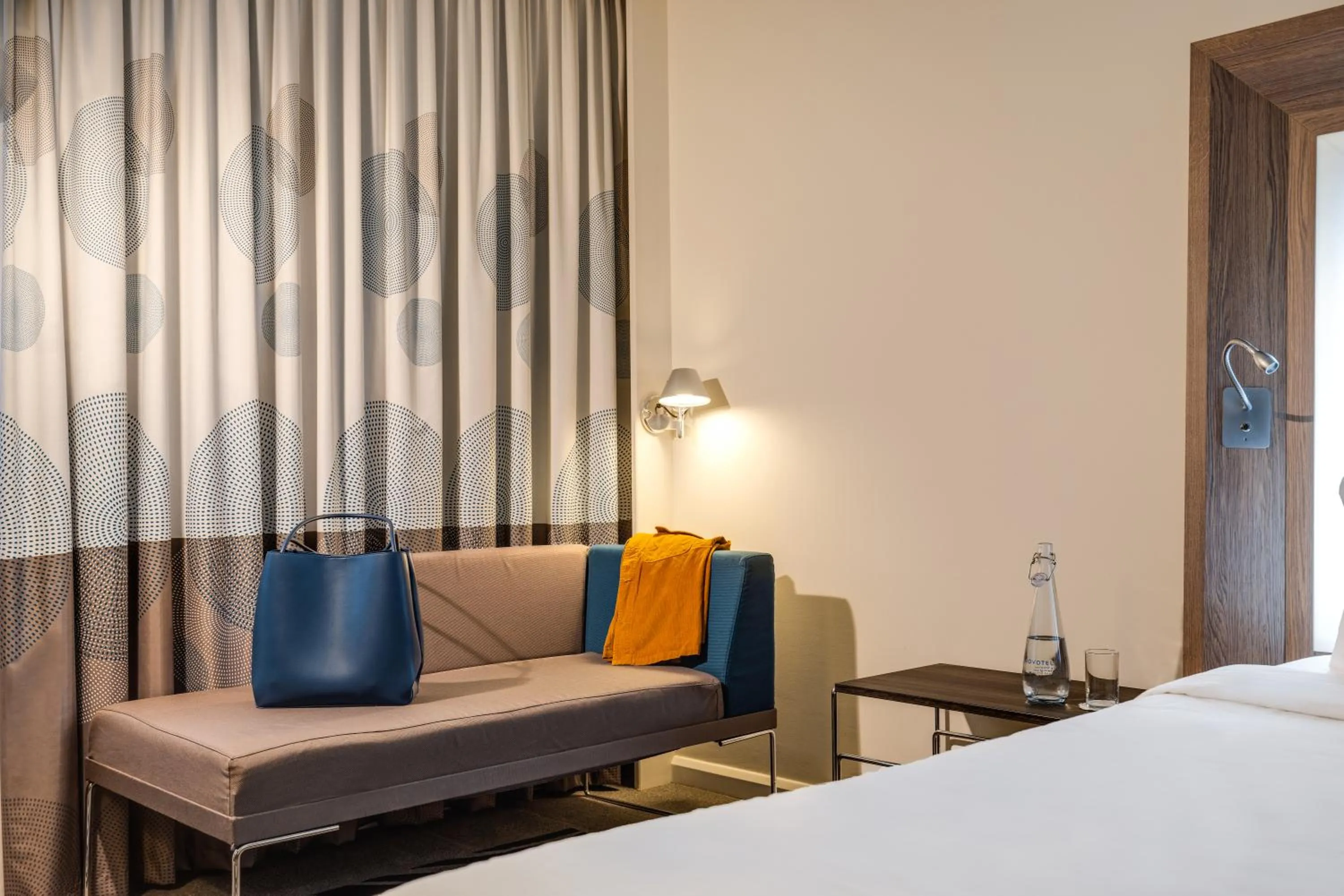 Seating area, Bed in Novotel London Tower Bridge