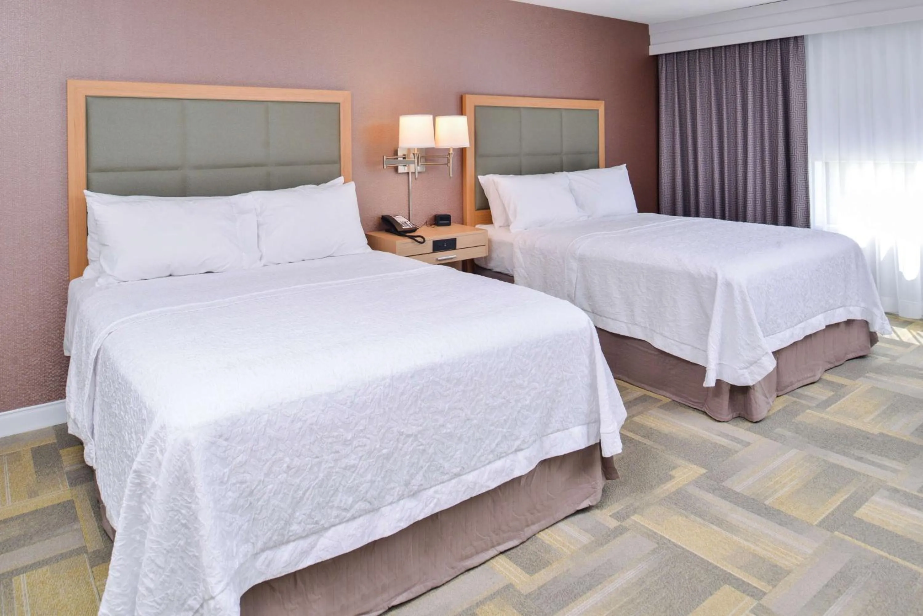Bed in Hampton Inn and Suites Altoona-Des Moines by Hilton