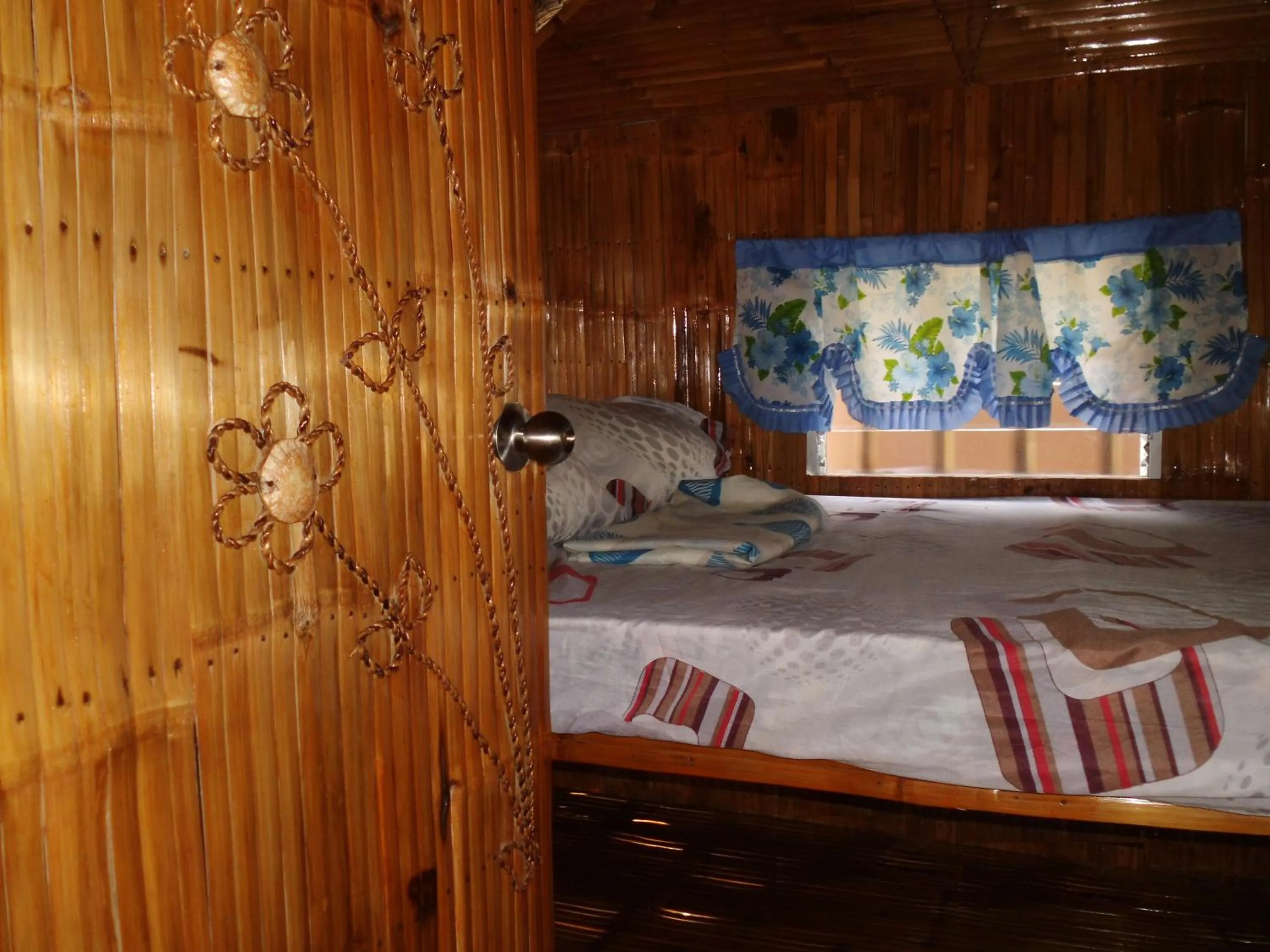 Bed in Moalboal Bamboo Guest House