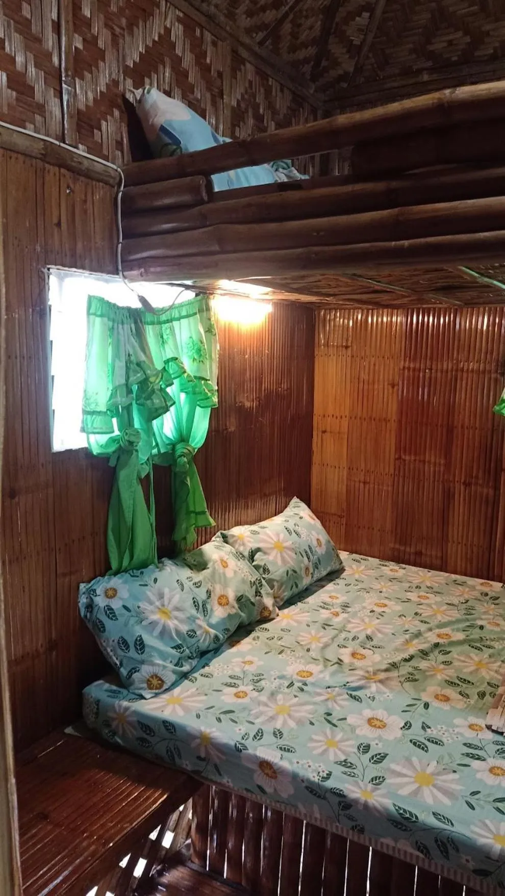 Bed in Moalboal Bamboo Guest House