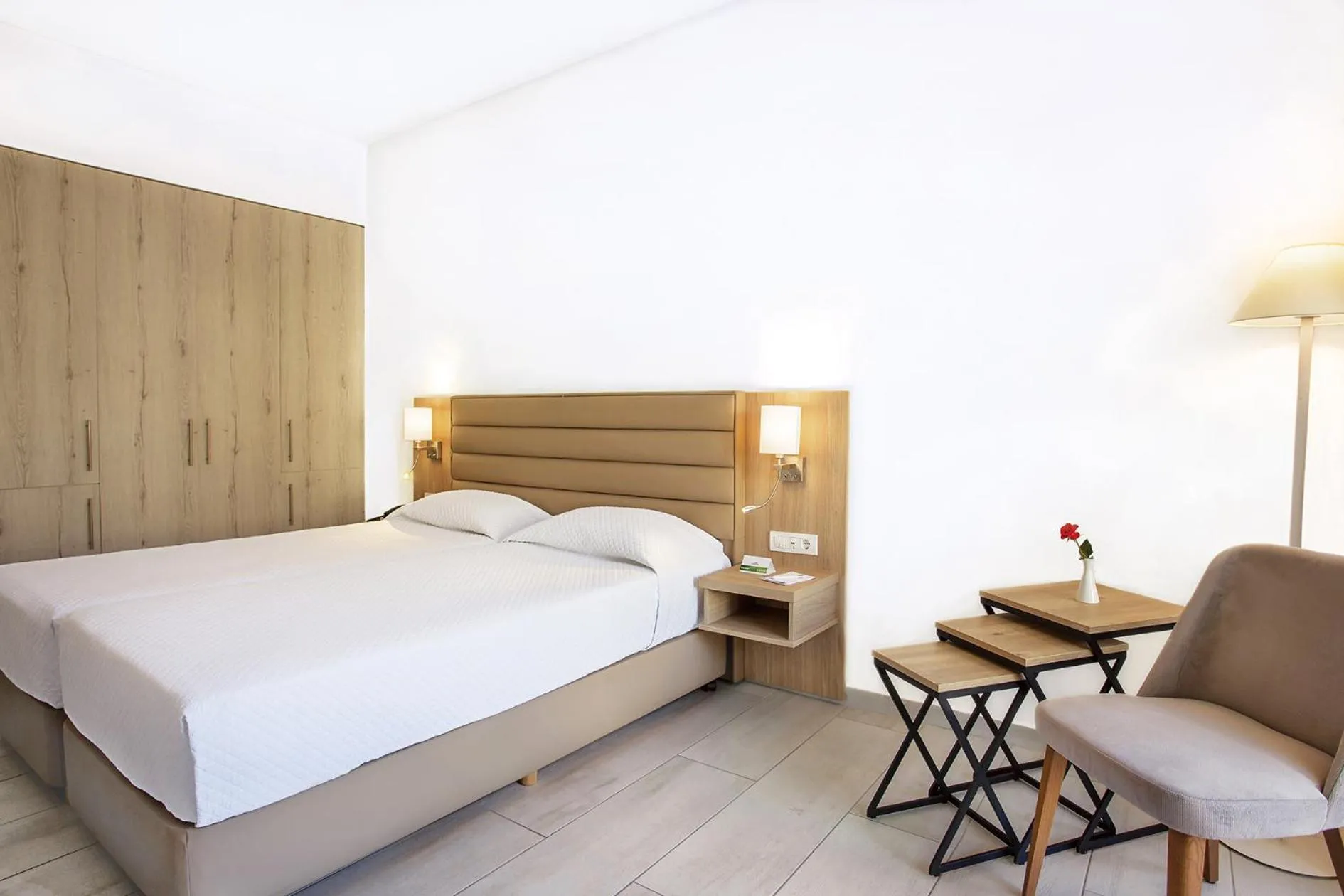 Bed in Eurovillage Achilleas Hotel