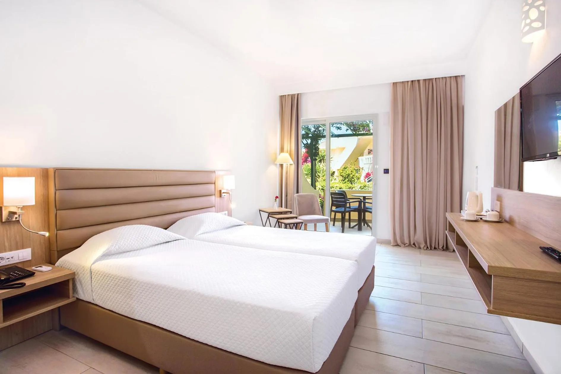 Bed in Eurovillage Achilleas Hotel