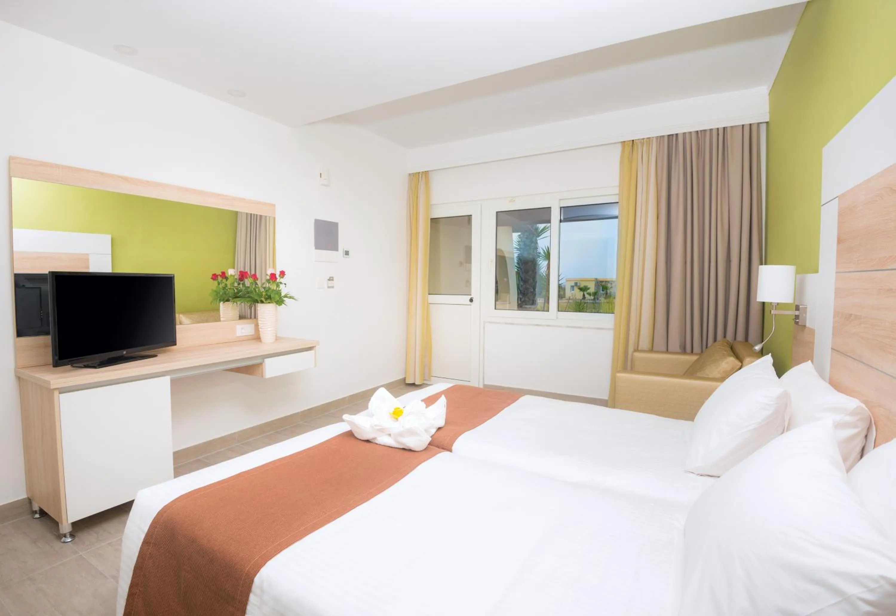 Bed in Eurovillage Achilleas Hotel