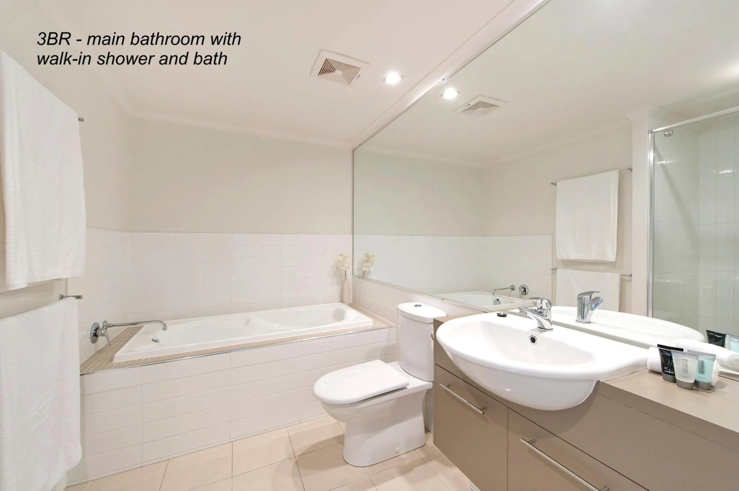 Shower in On the Bay Apartments