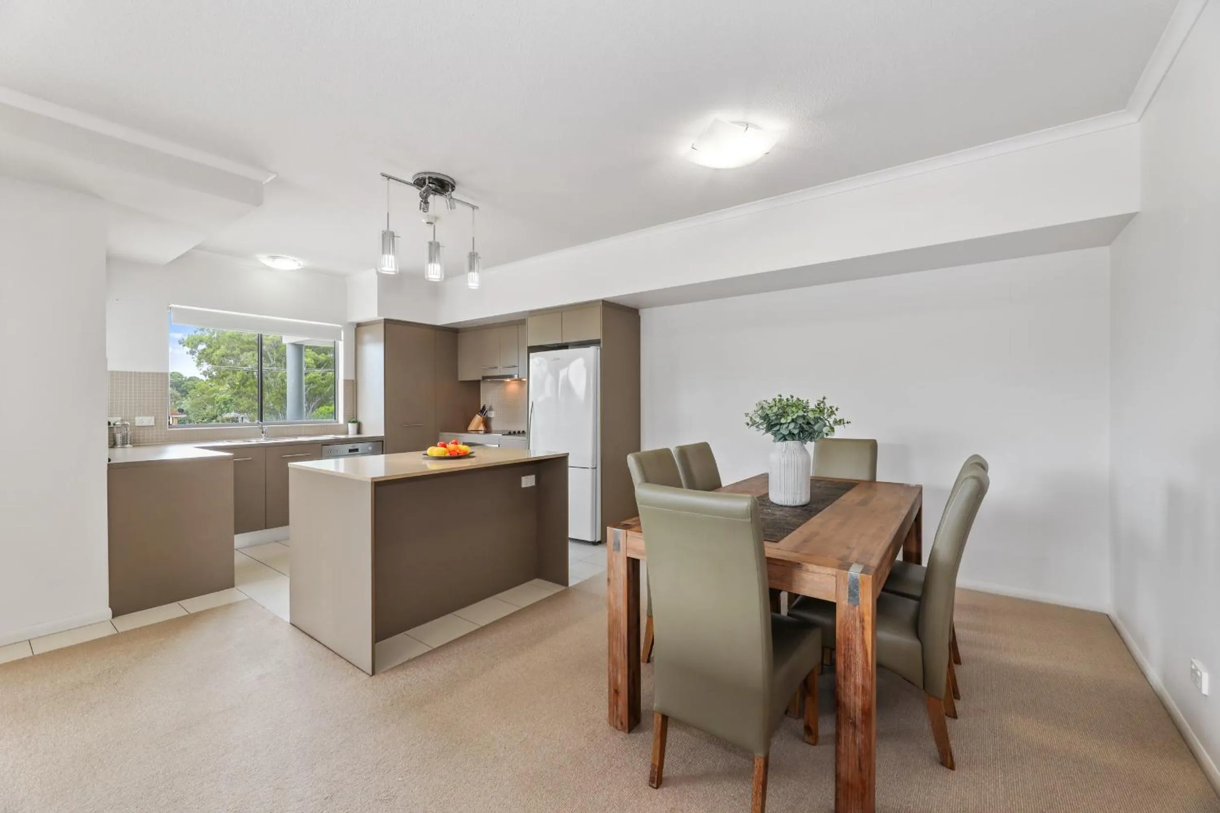 Dining area in On the Bay Apartments