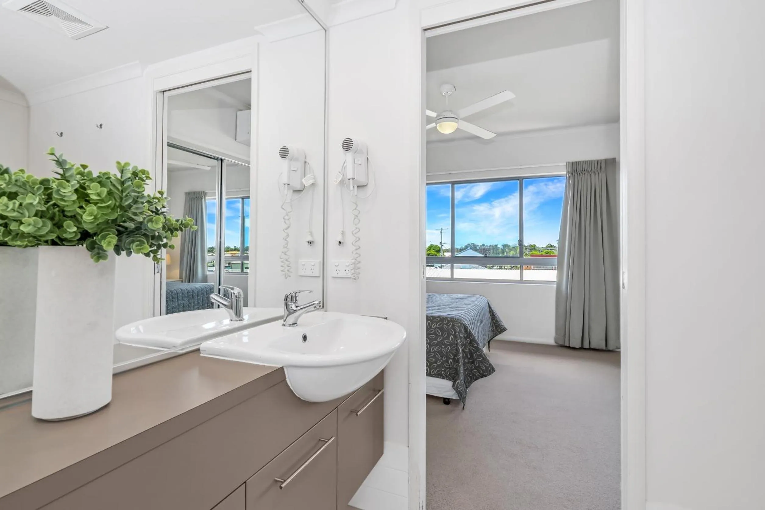 Bed in On the Bay Apartments