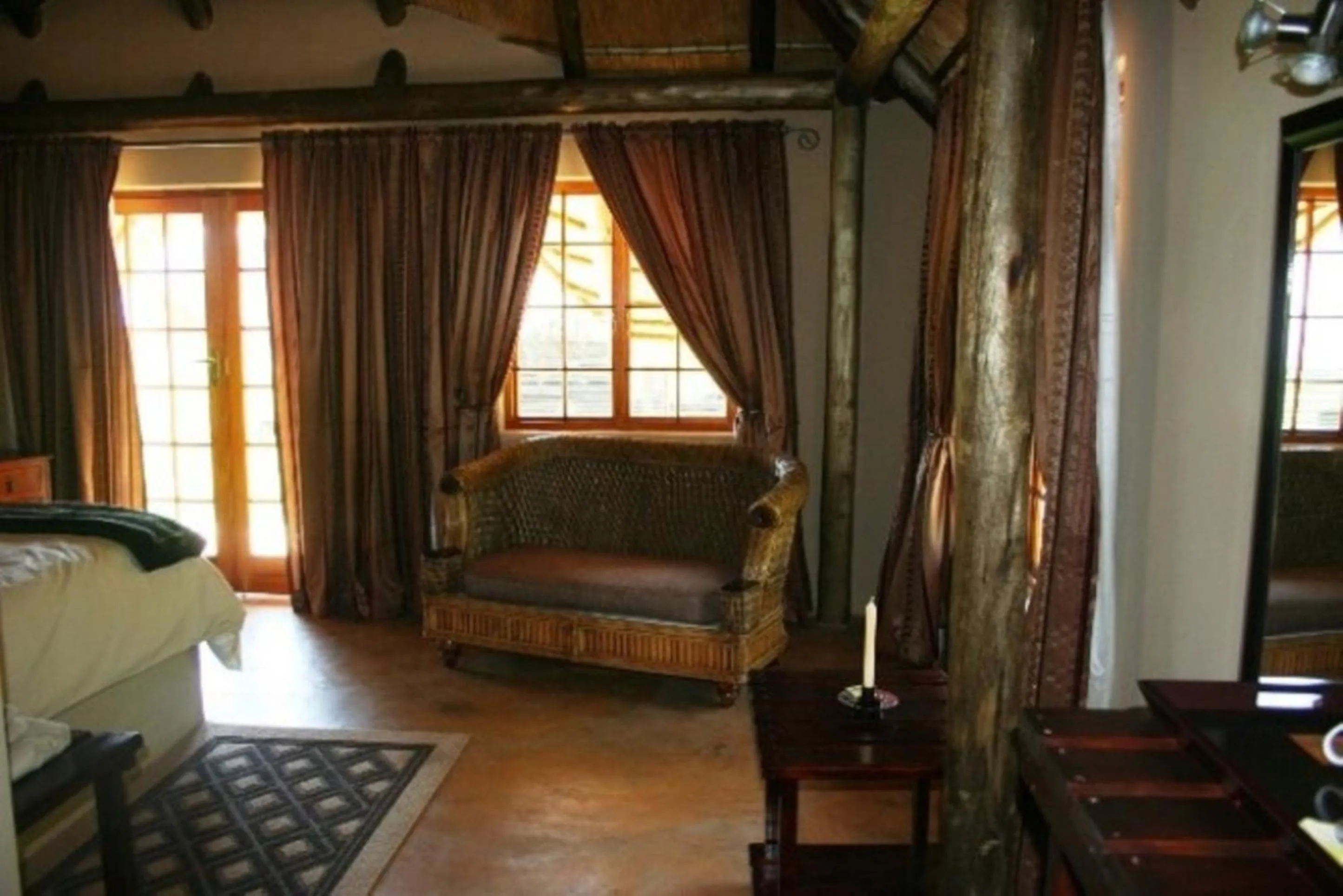 Bed in African Flair Country Lodge