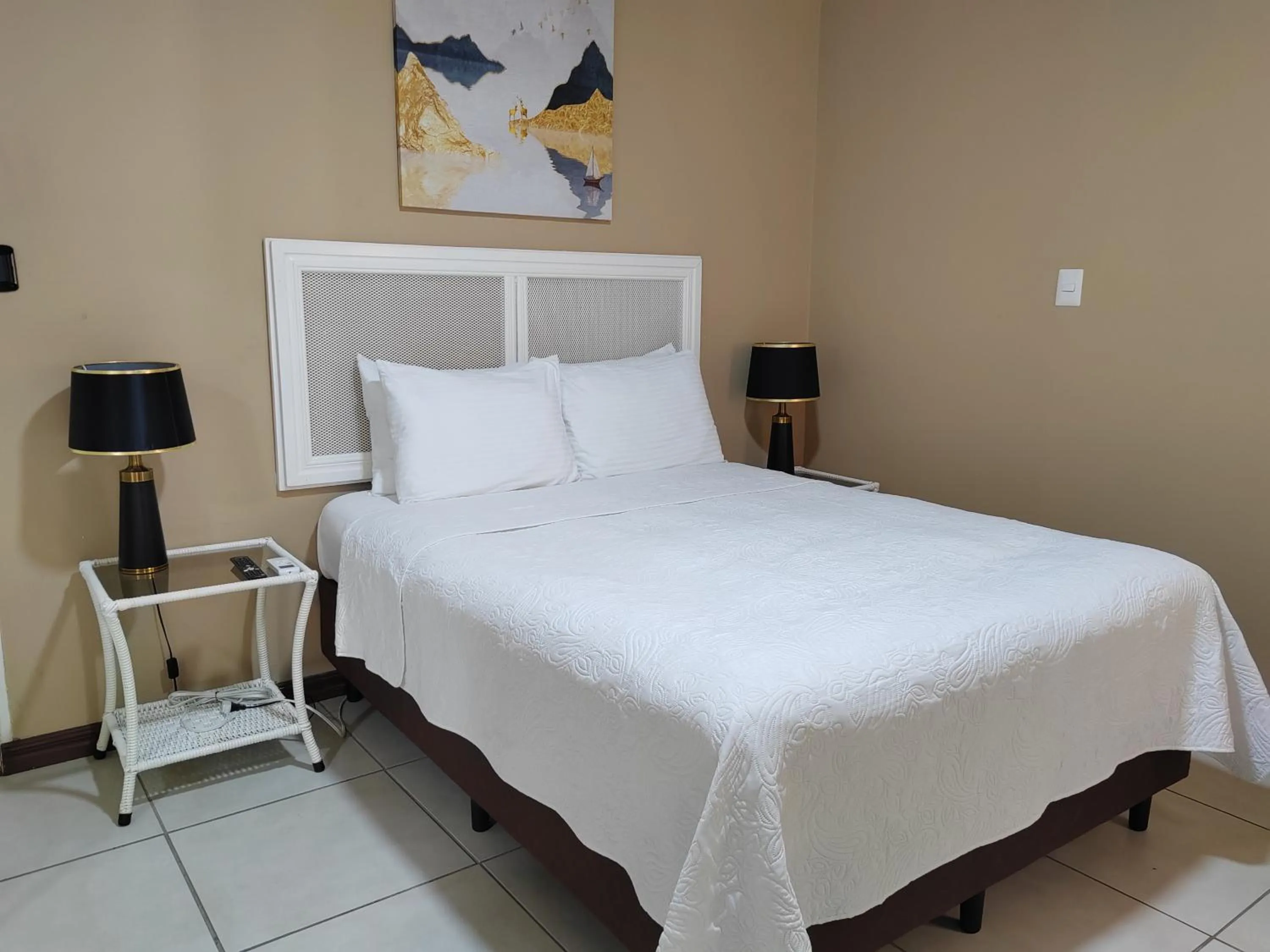 Bed in Hotel Bamboo Aeropuerto