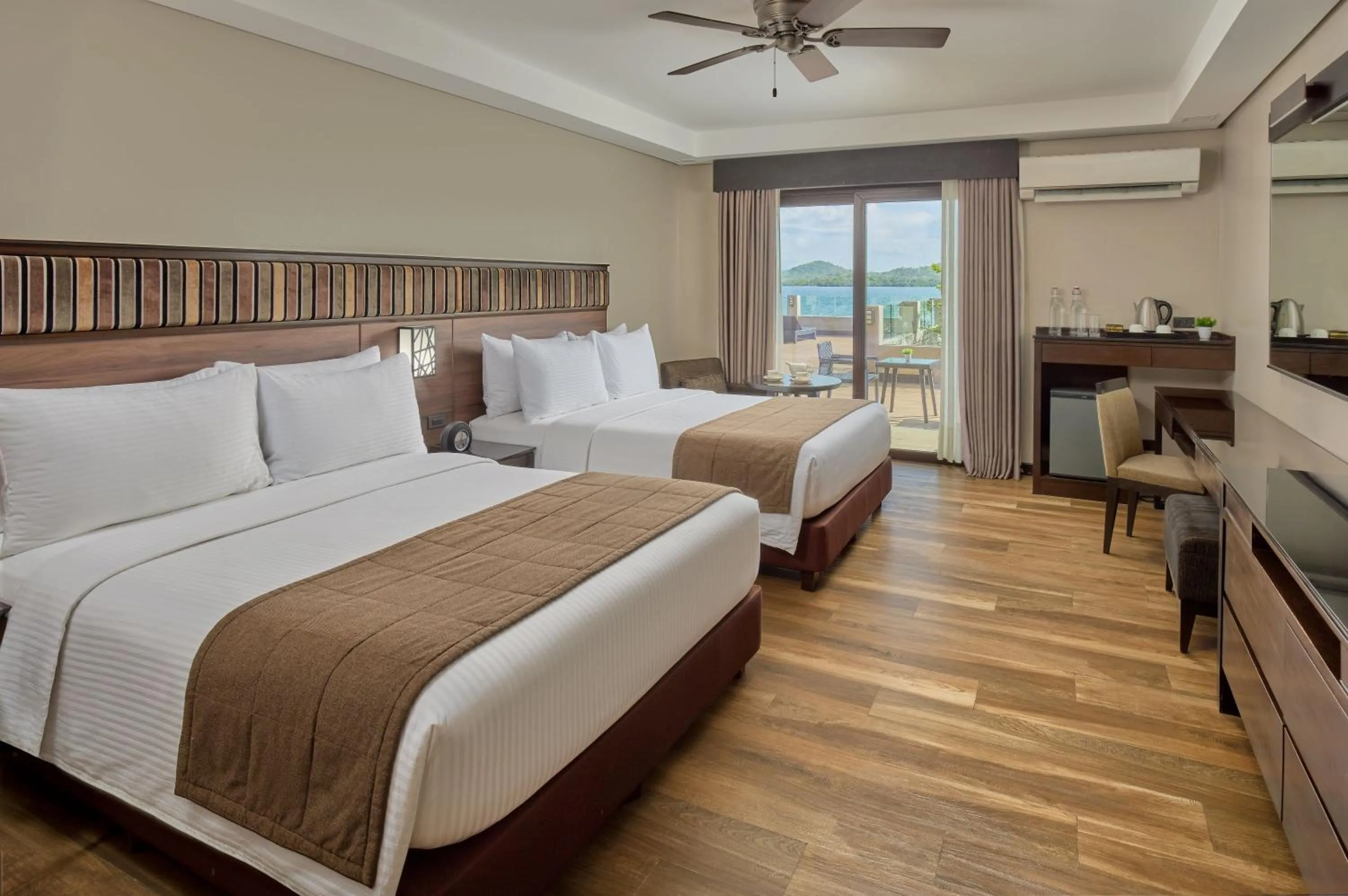 Bed in Two Seasons Coron Bayside Hotel