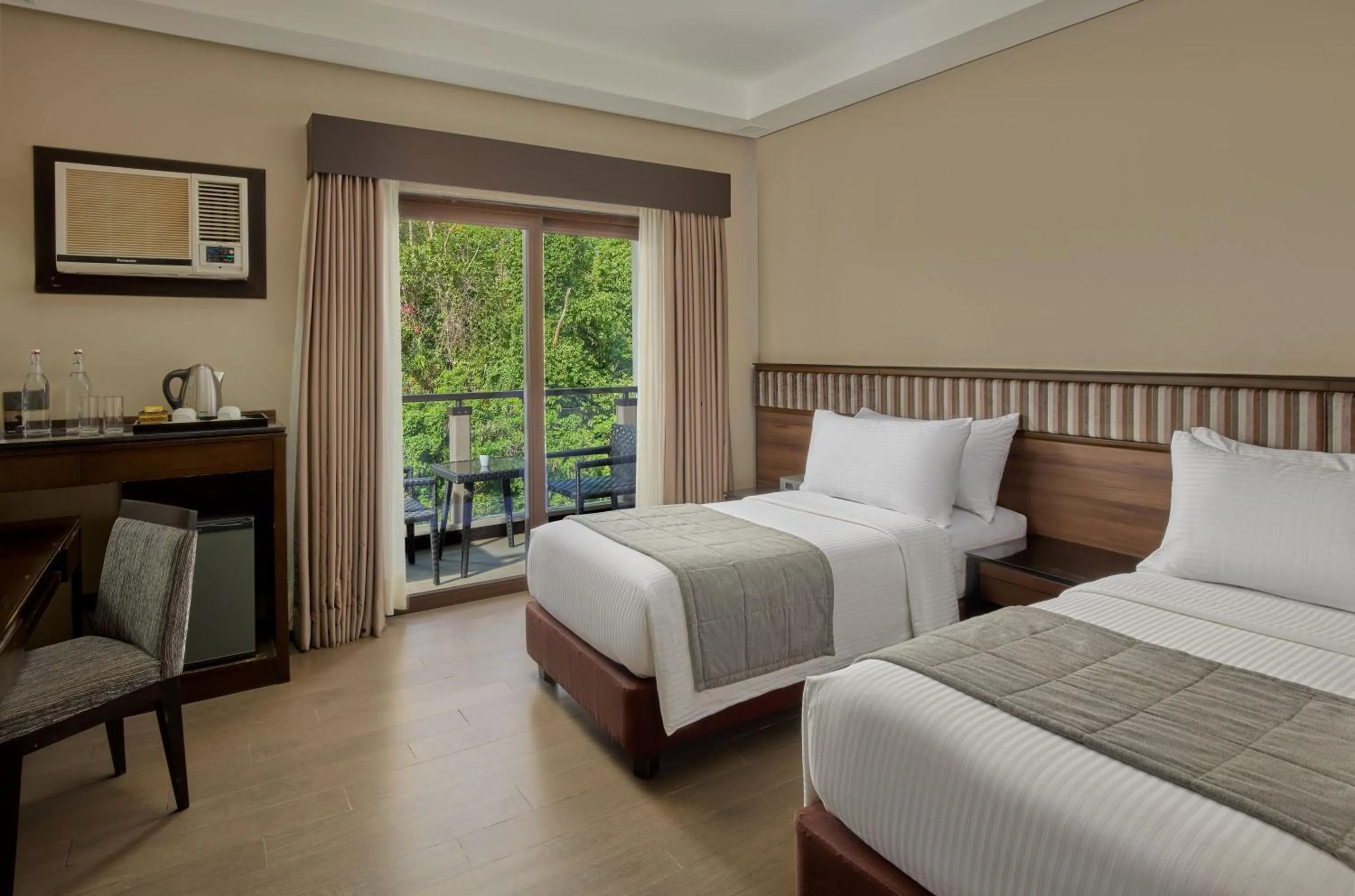 Bed in Two Seasons Coron Bayside Hotel