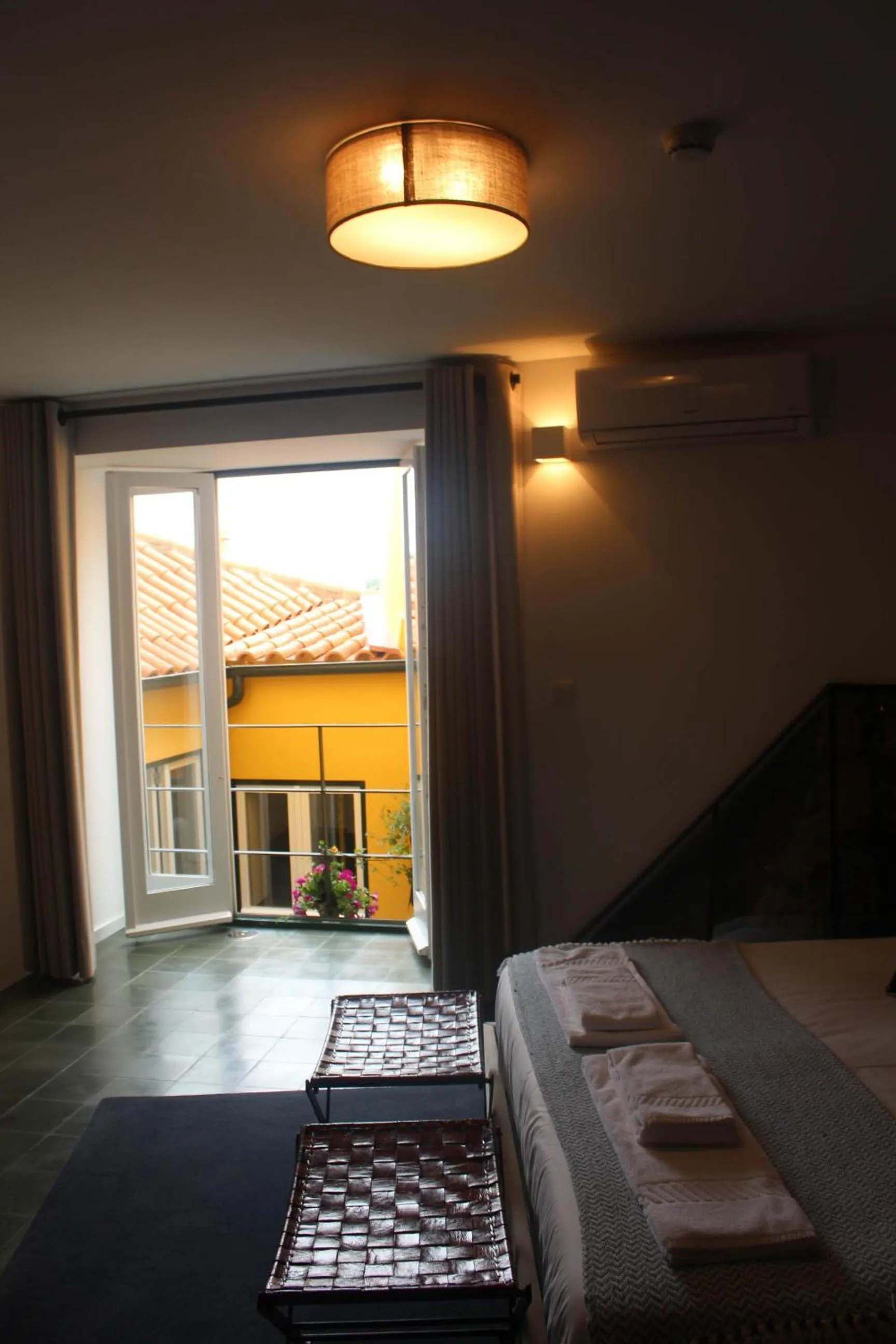Garden view, Bed in Arco Apartments