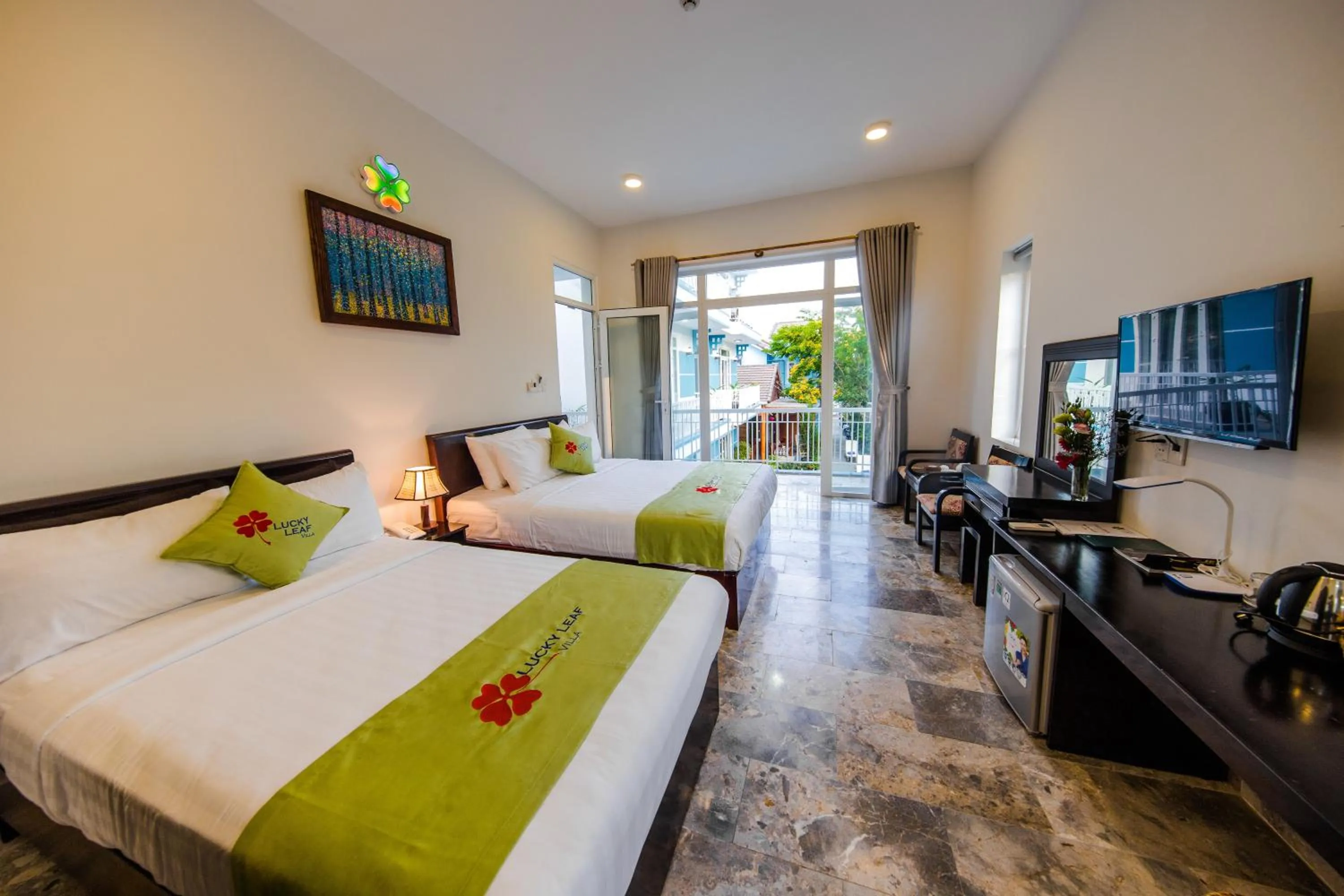 Bed in Lucky Leaf Hoian Villa