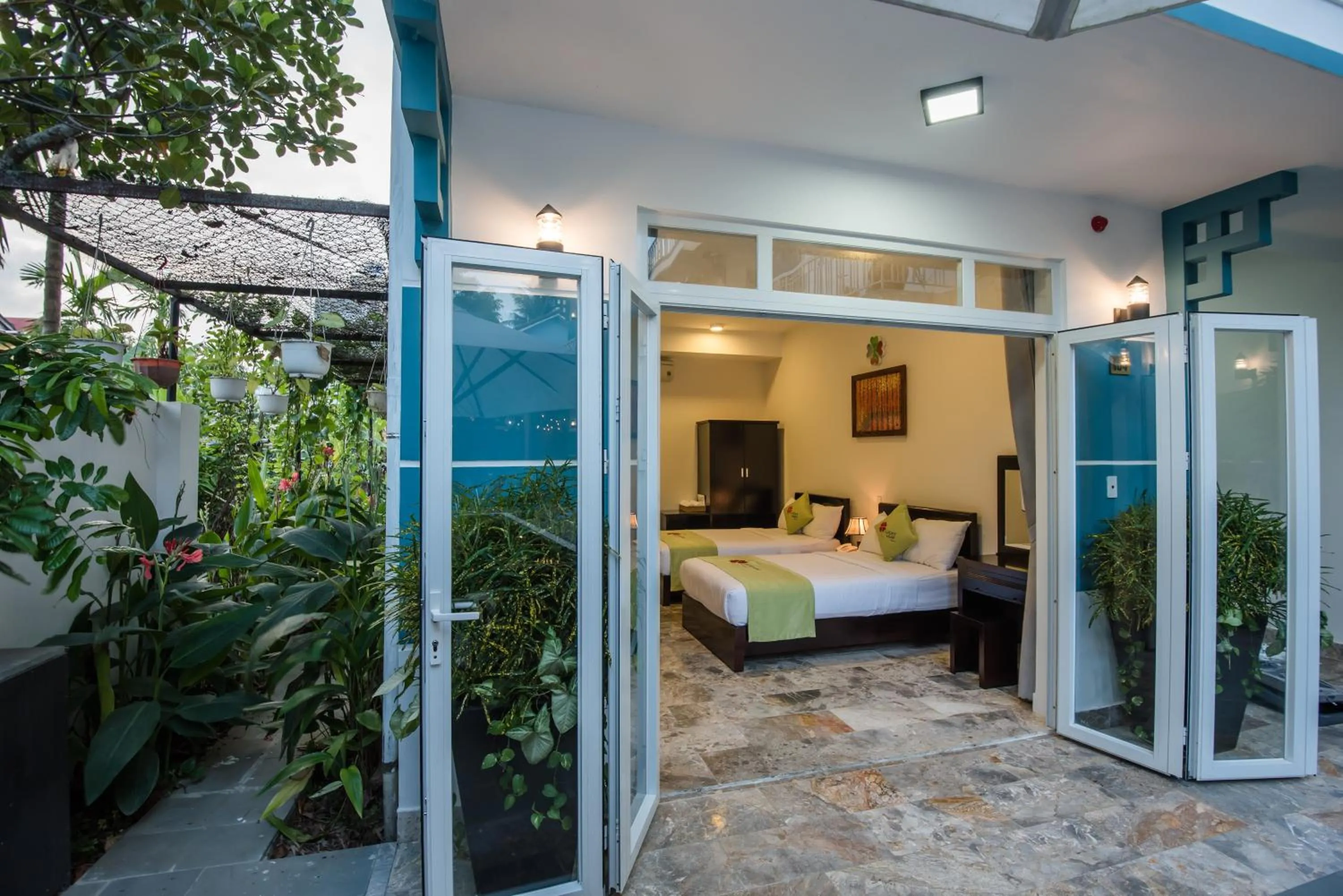 Bed in Lucky Leaf Hoian Villa