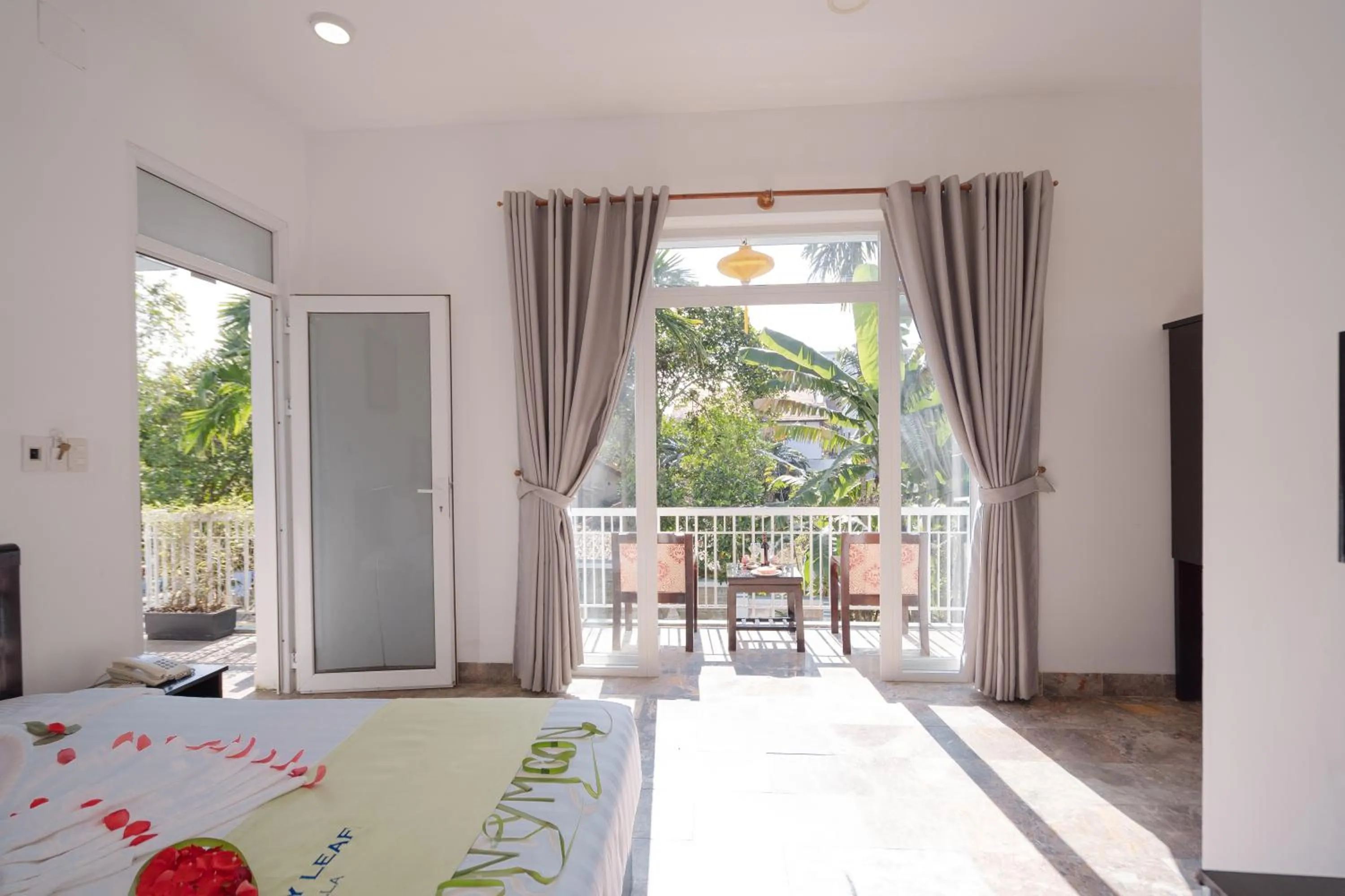 Bed in Lucky Leaf Hoian Villa