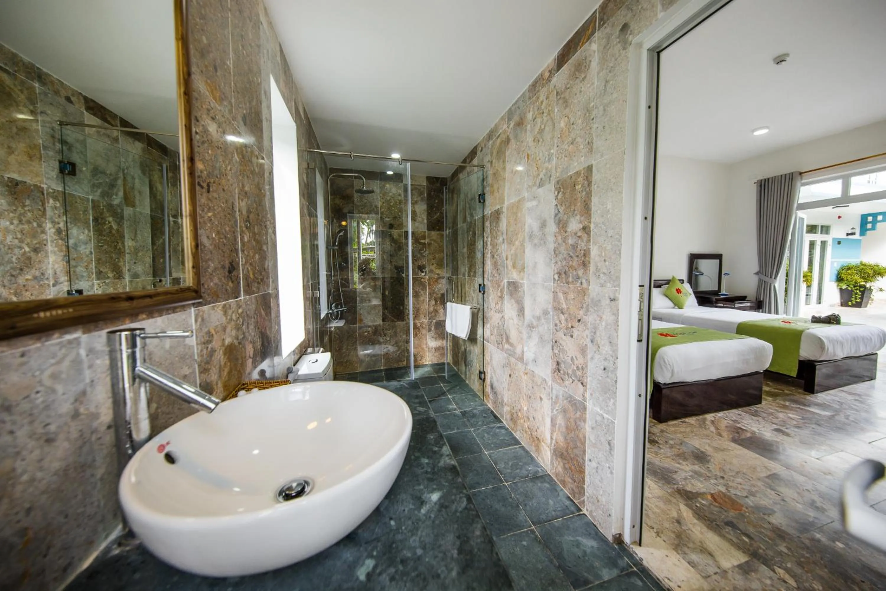 Bed in Lucky Leaf Hoian Villa