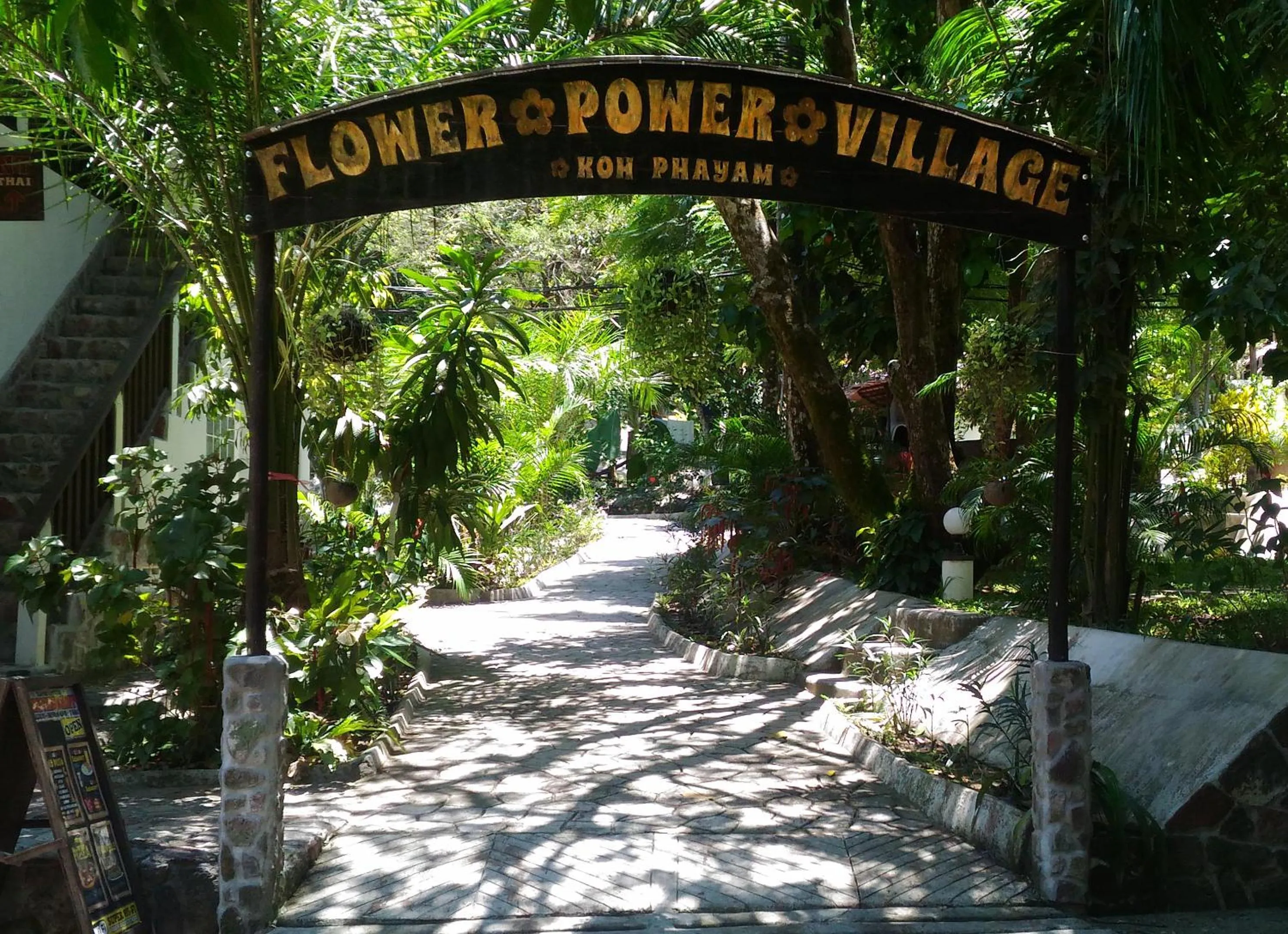 Property logo or sign in Flower Power Farm Village