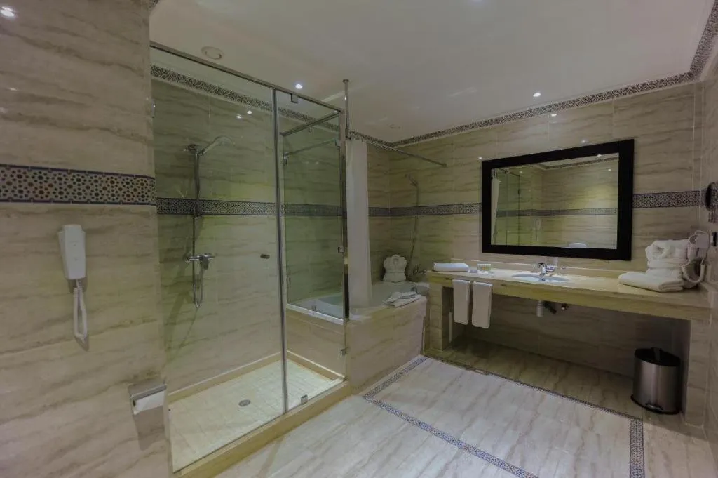 Toilet in Ennakhil Marrakech Hotel & SPA