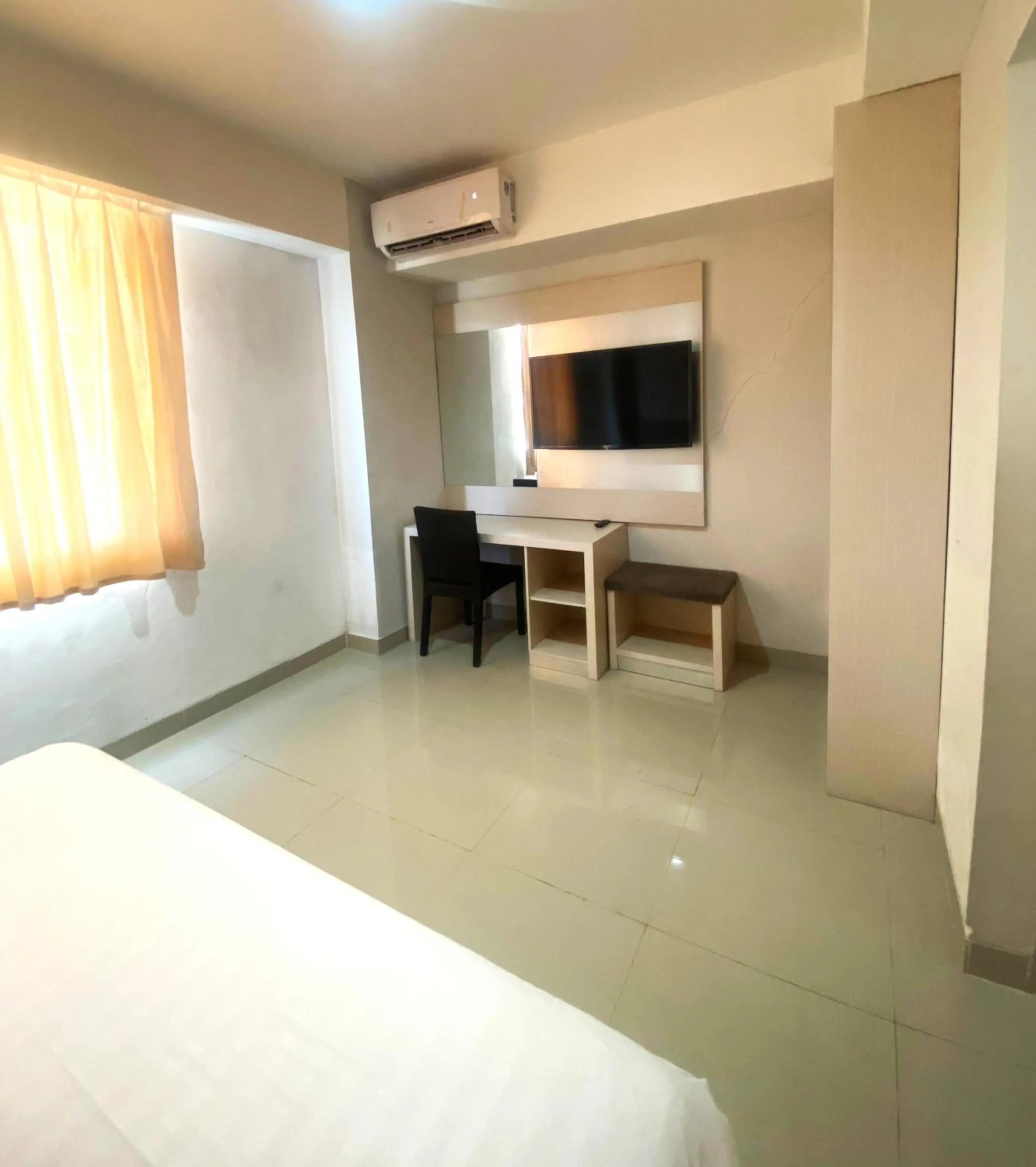 Bed in Liberta Hotel Grand Sayang Makassar