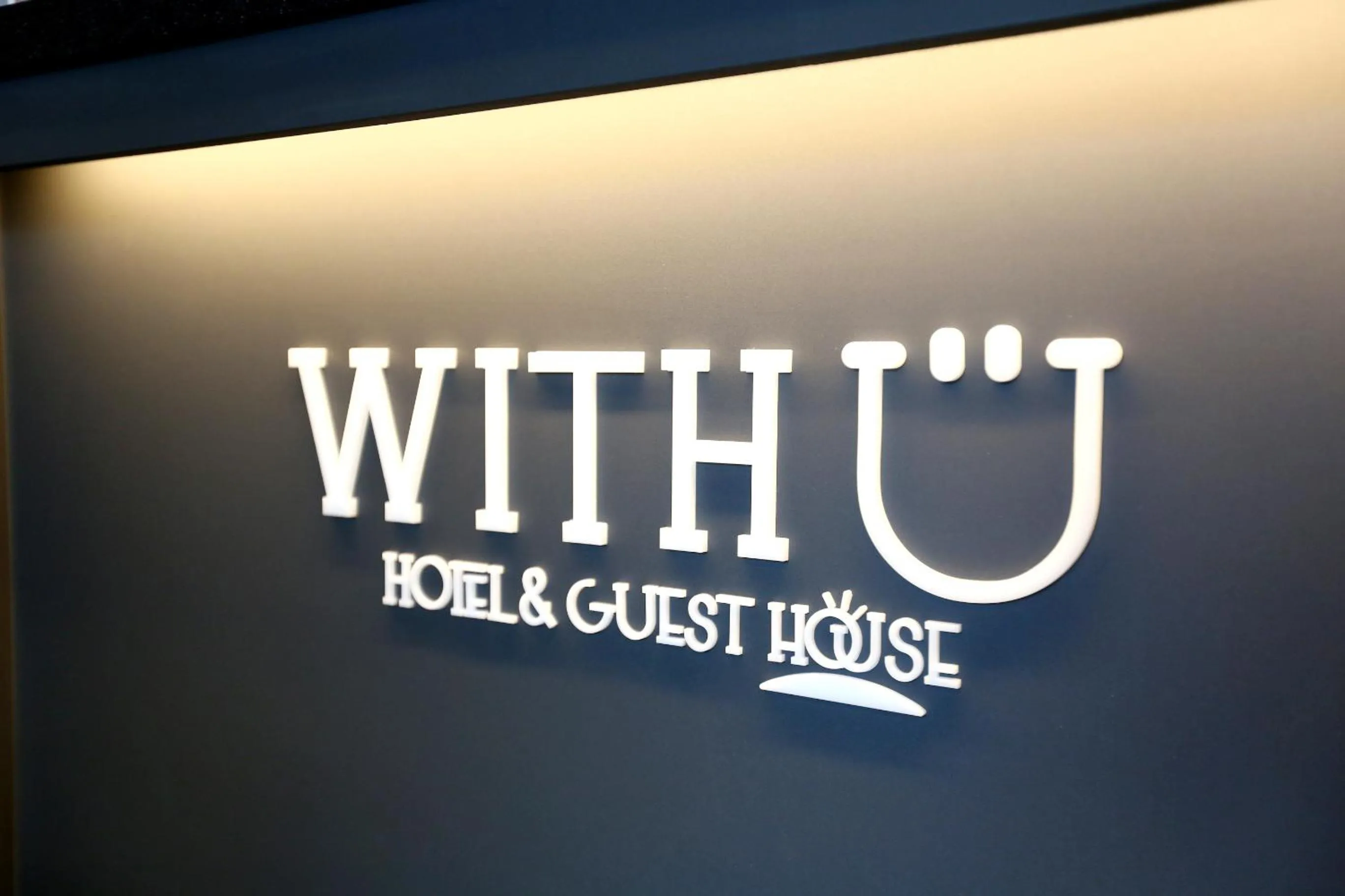 Property logo or sign in With U Hotel & Guesthouse