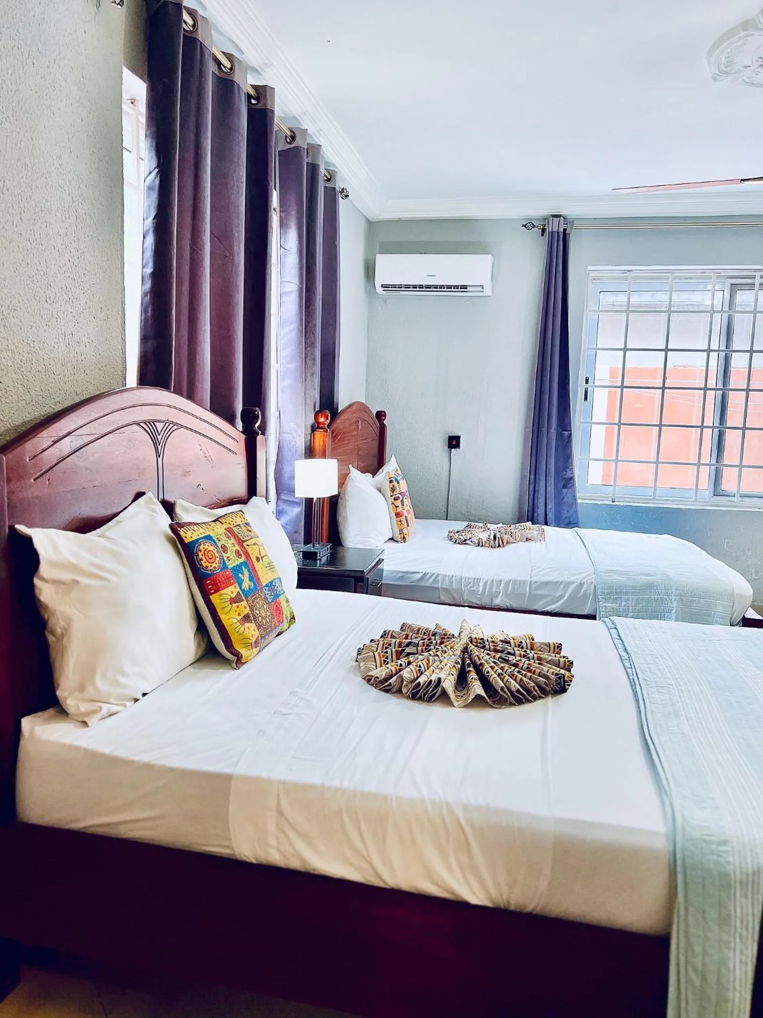 Bed in Coconut Pointe Villa & Beach Resort