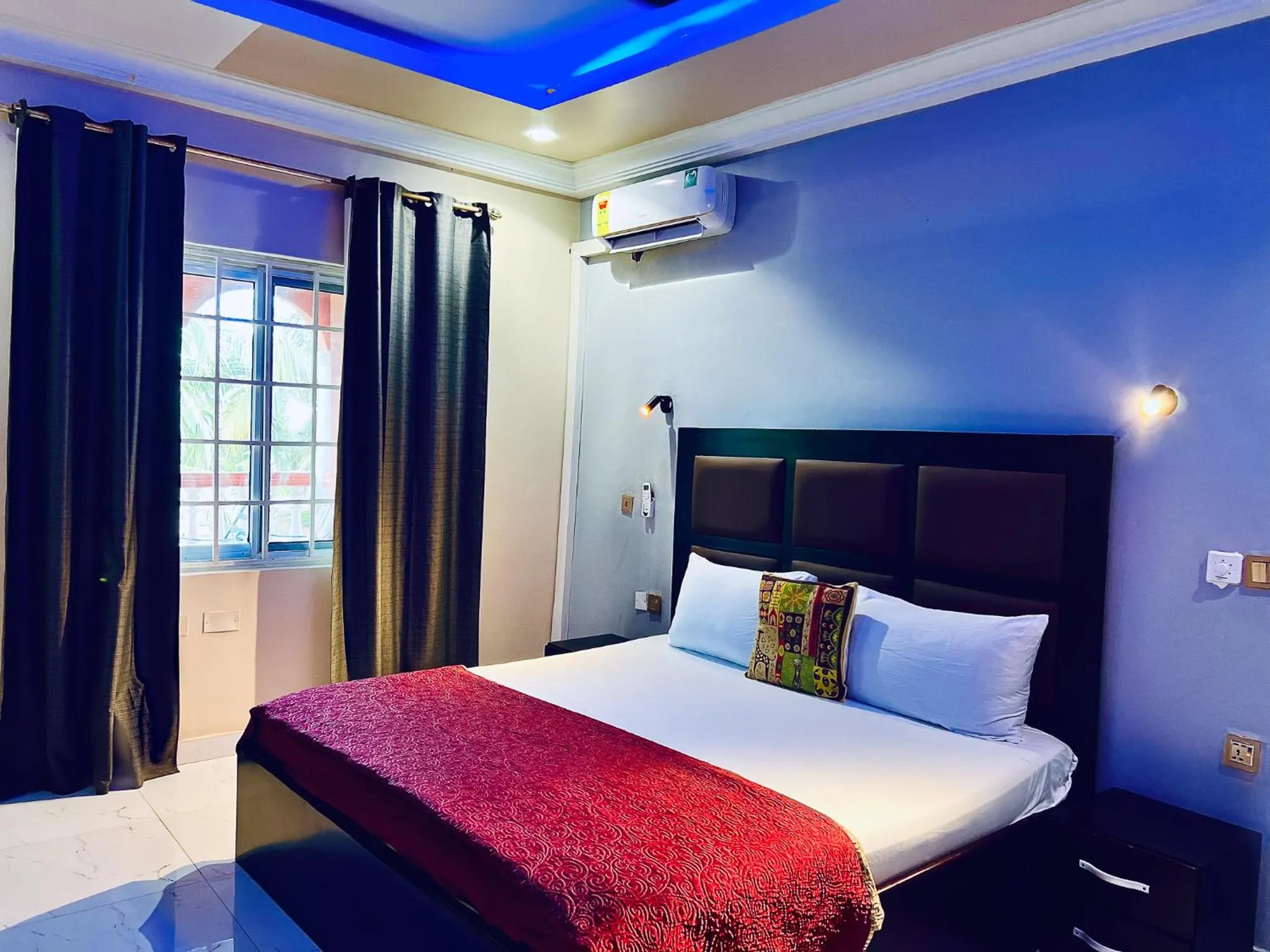 Bed in Coconut Pointe Villa & Beach Resort