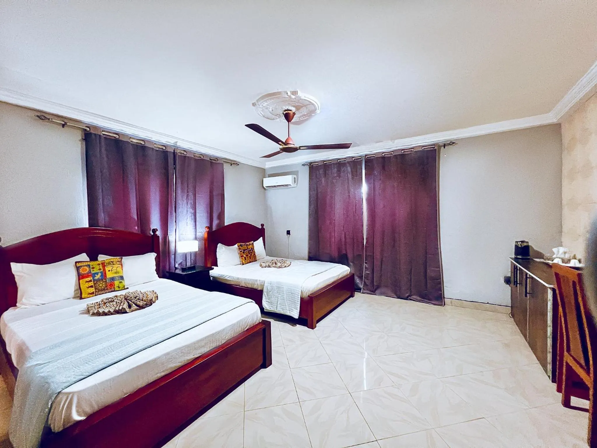 Bed in Coconut Pointe Villa & Beach Resort