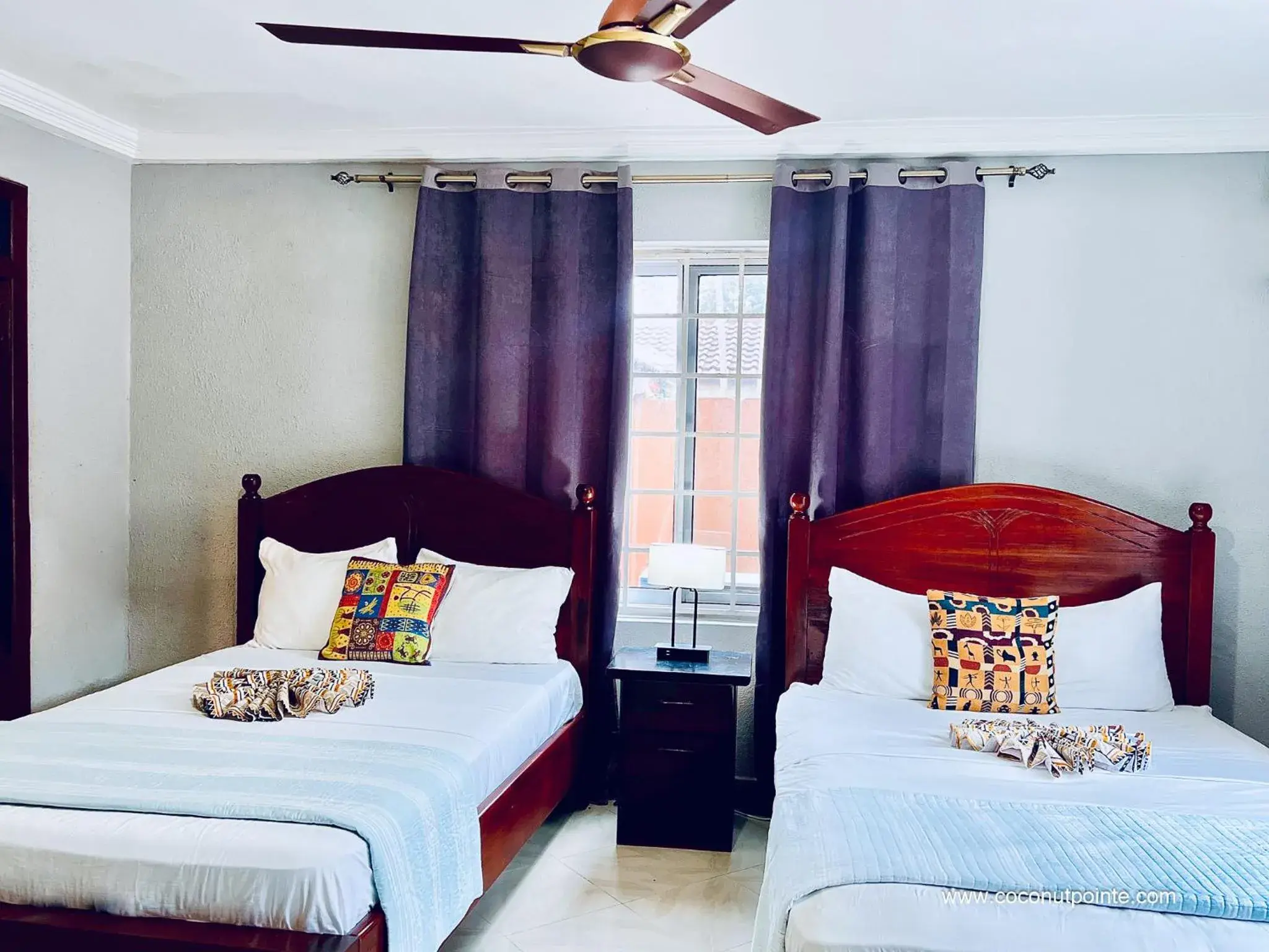 Deluxe Queen Room in Coconut Pointe Villa & Beach Resort Deluxe Queen Room in Coconut Pointe Villa & Beach Resort