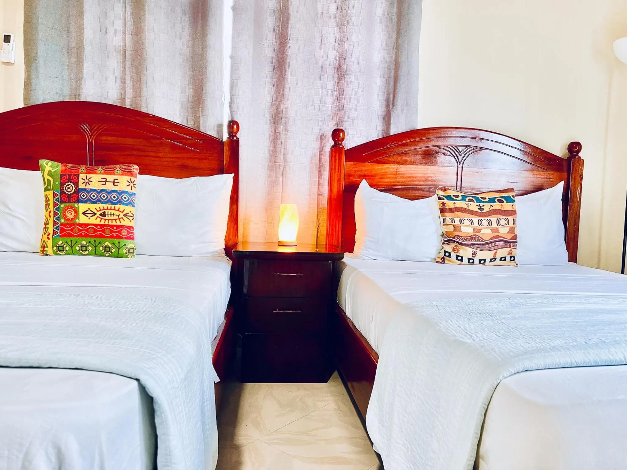 Bed in Coconut Pointe Villa & Beach Resort