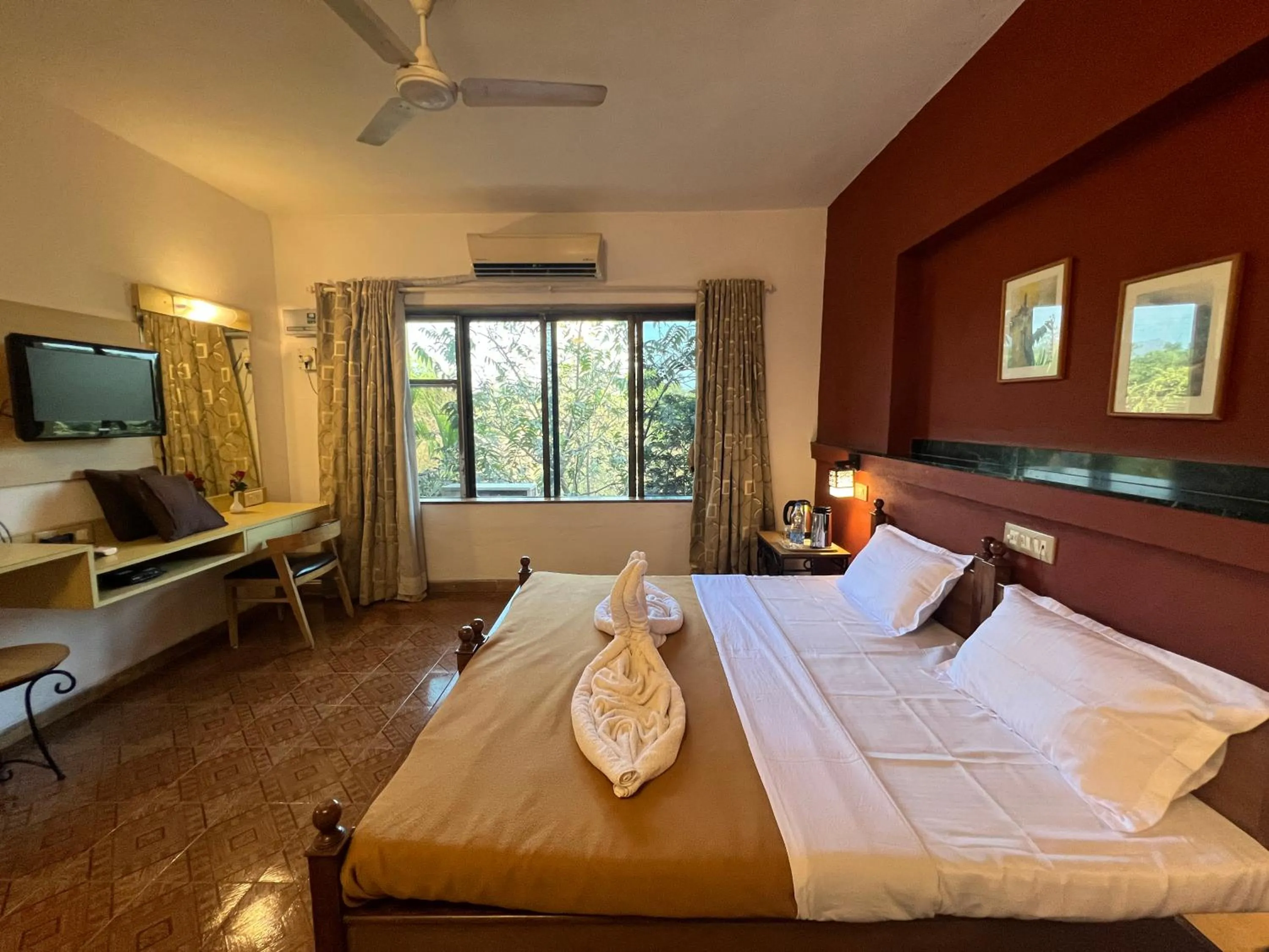 Bed in Konkan Crown Resort & Club