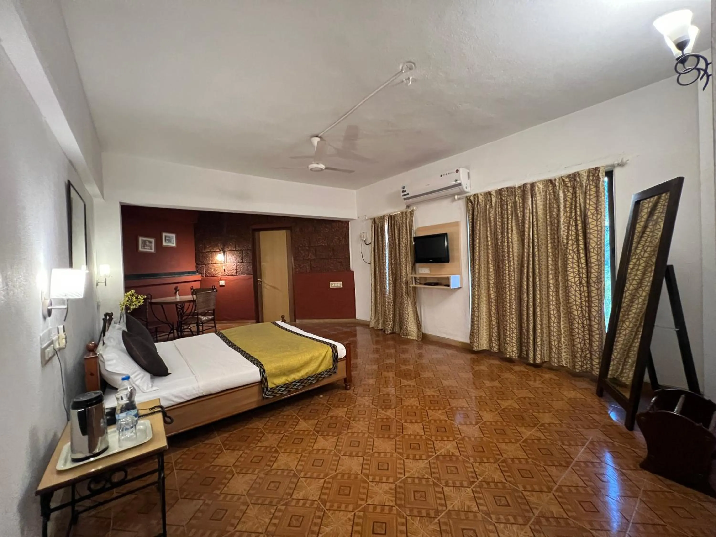 Bed in Konkan Crown Resort & Club