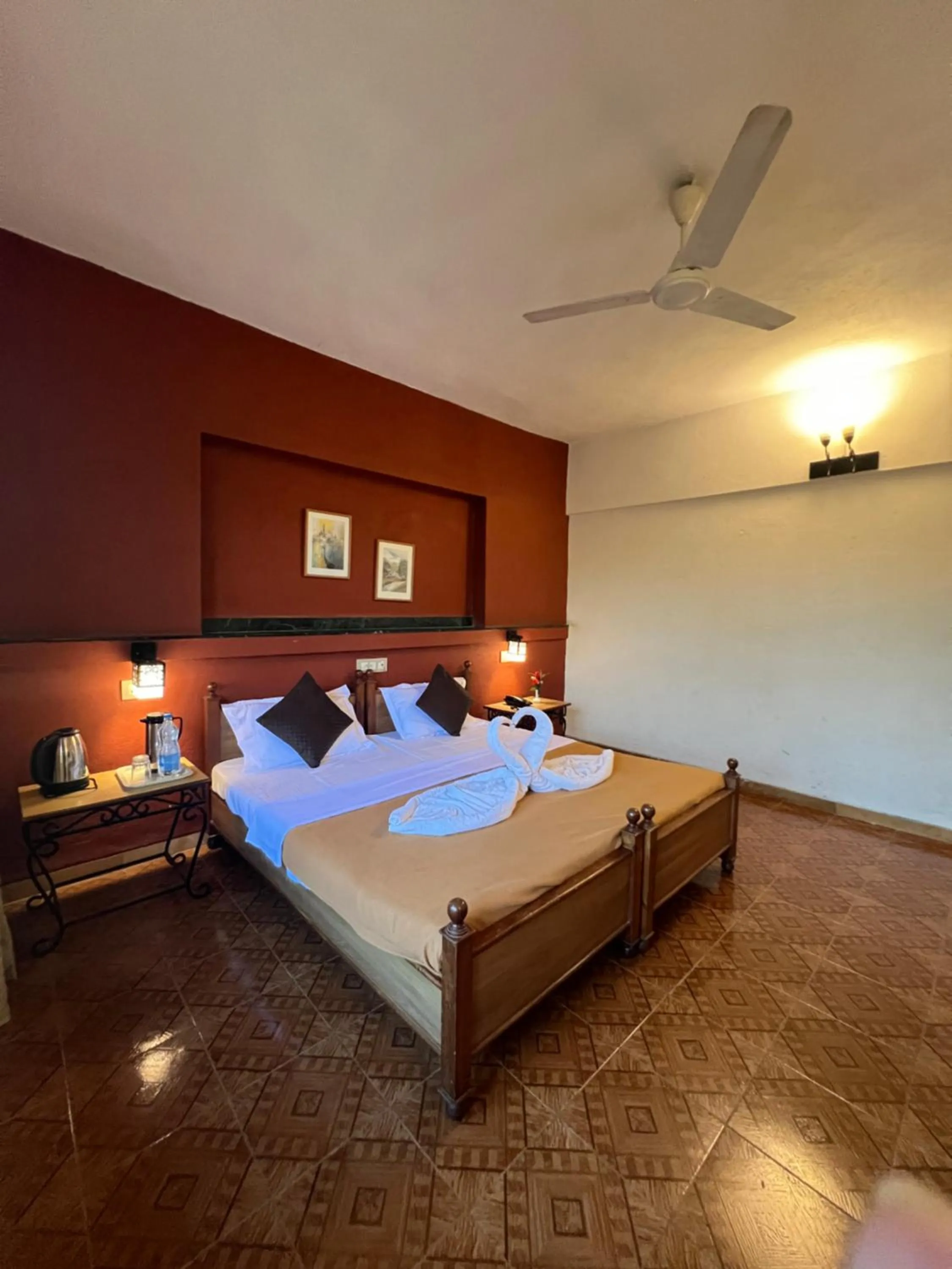 Bed in Konkan Crown Resort & Club