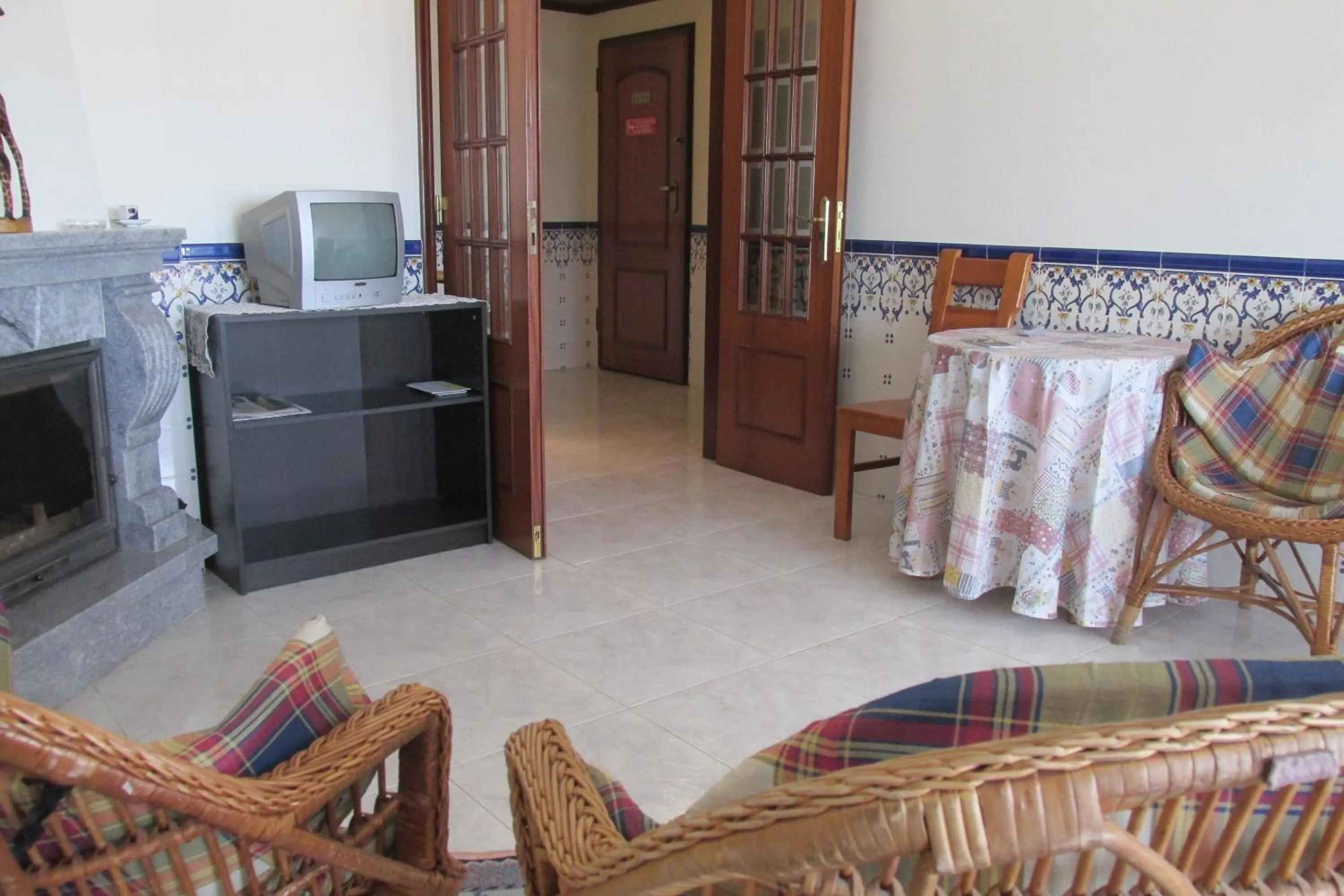 Communal lounge/ TV room in Homestay Marialva Park
