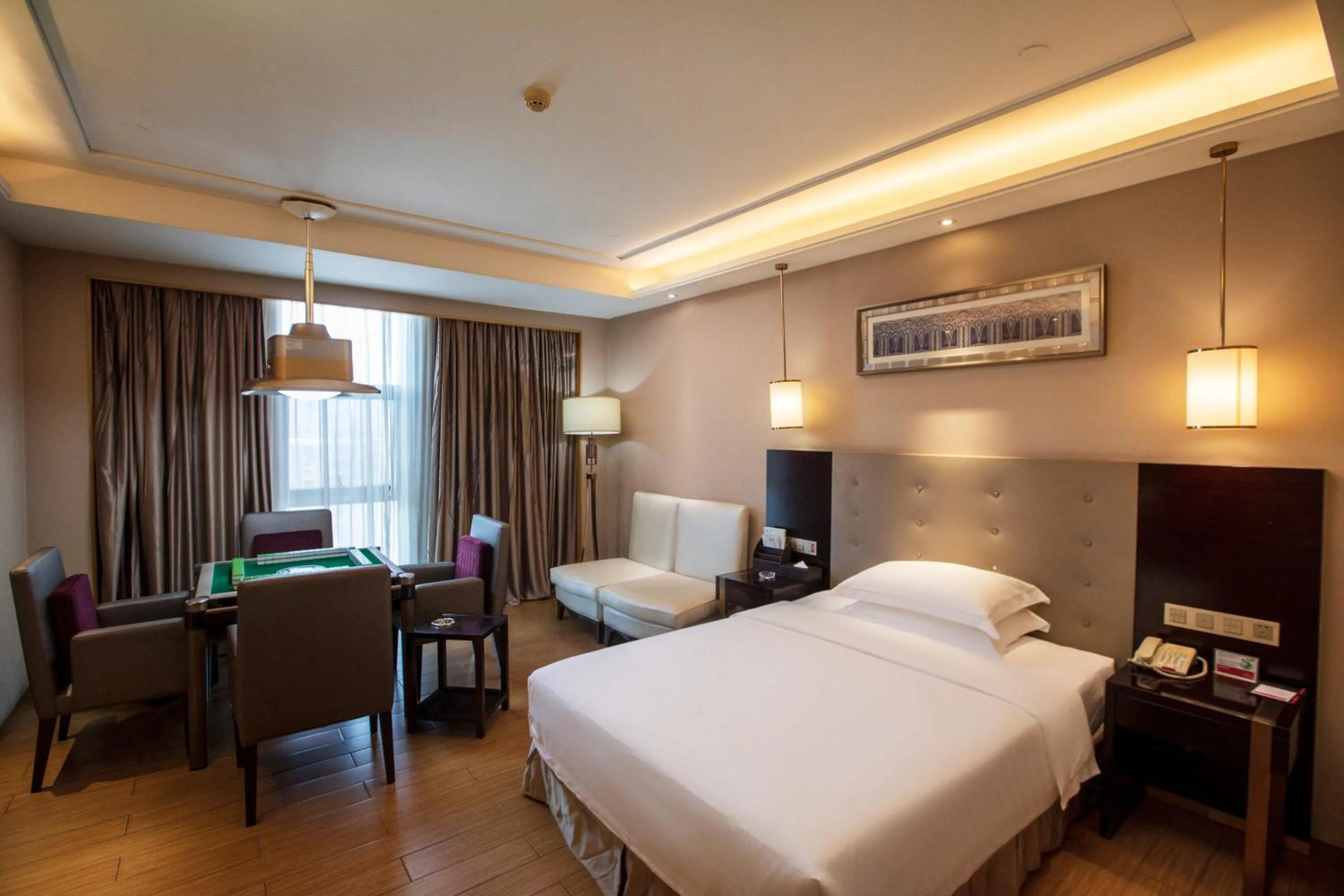 Bed in Ramada Yiyang Taojiang