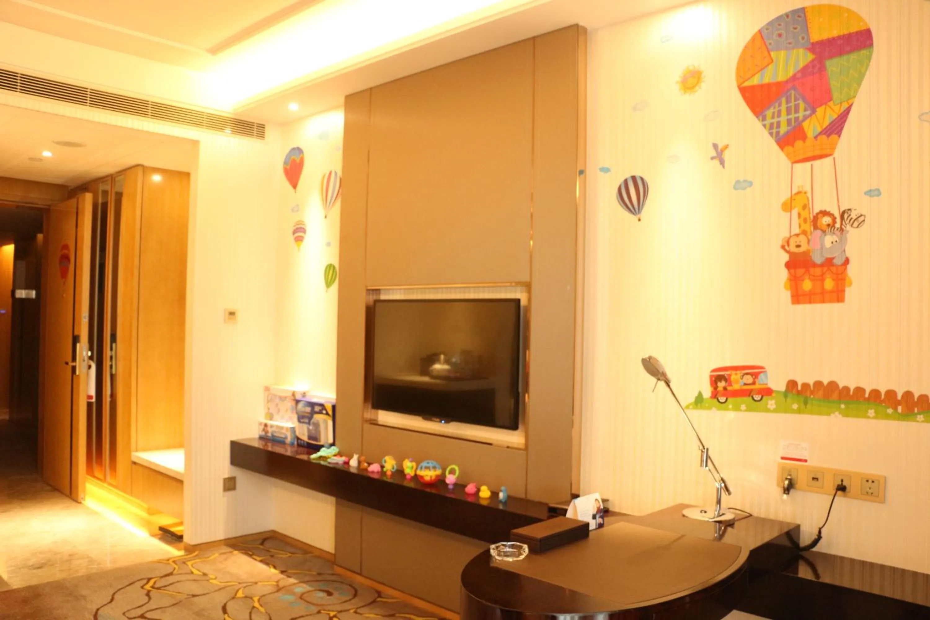 Living room in Ramada Yiyang Taojiang
