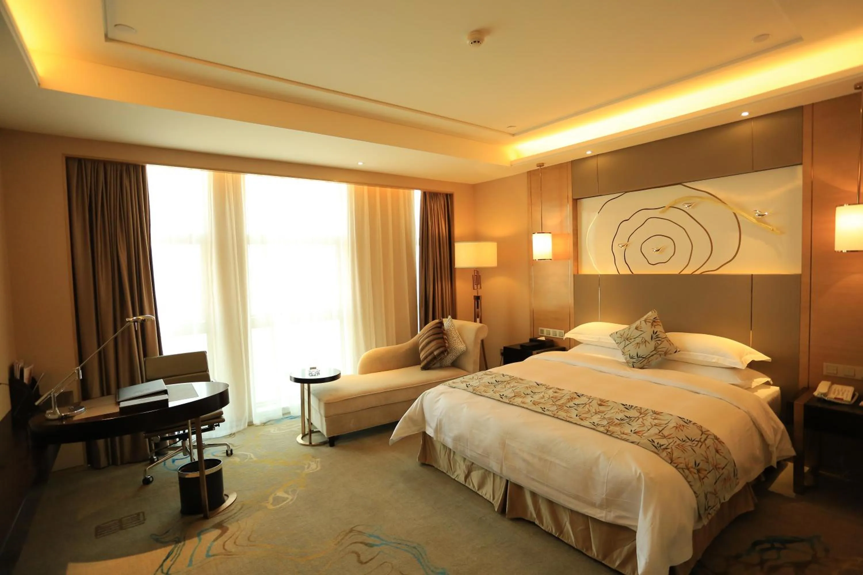 Bed in Ramada Yiyang Taojiang