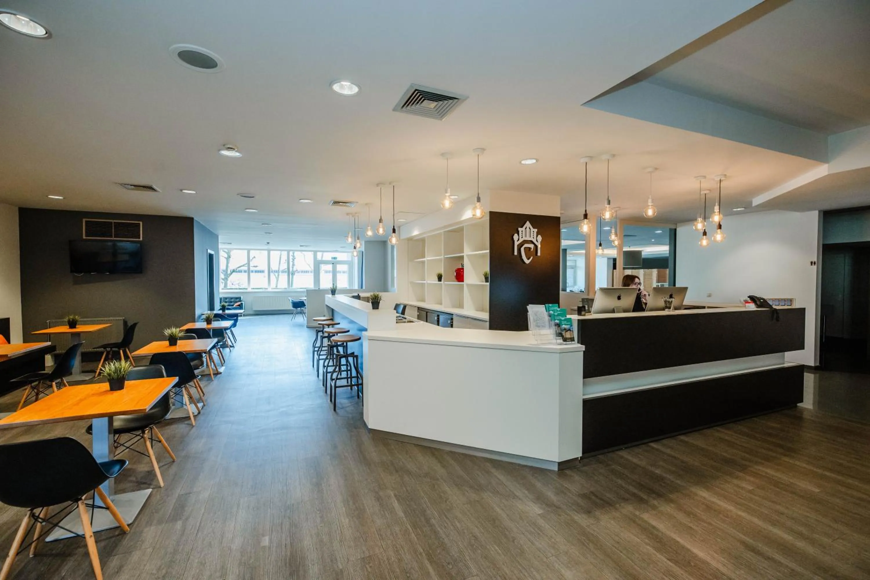 Communal lounge/ TV room in Hotel Corsendonk Viane