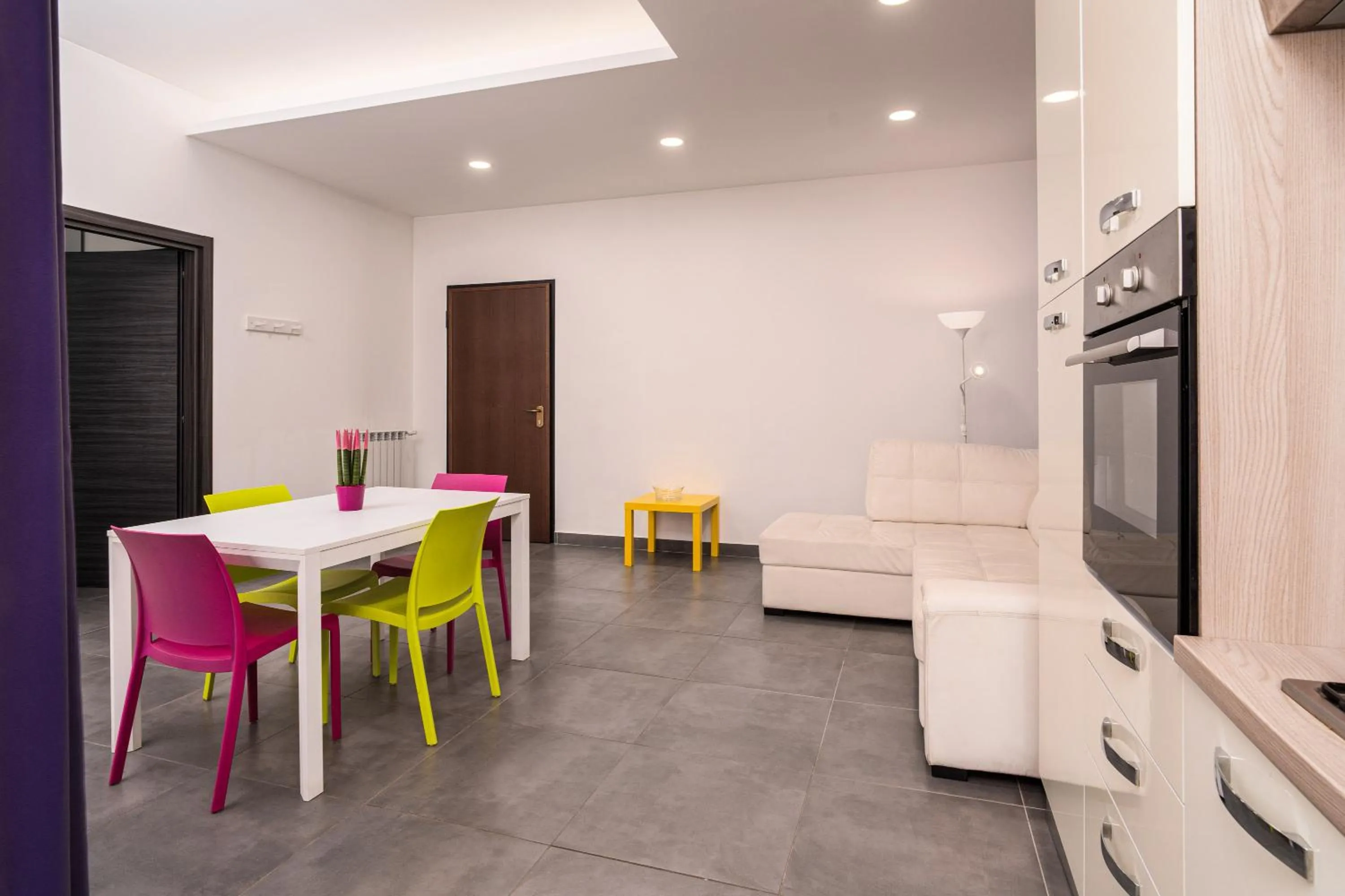 Living room in Residence Palazzo dei Delfini by RECEPTIO