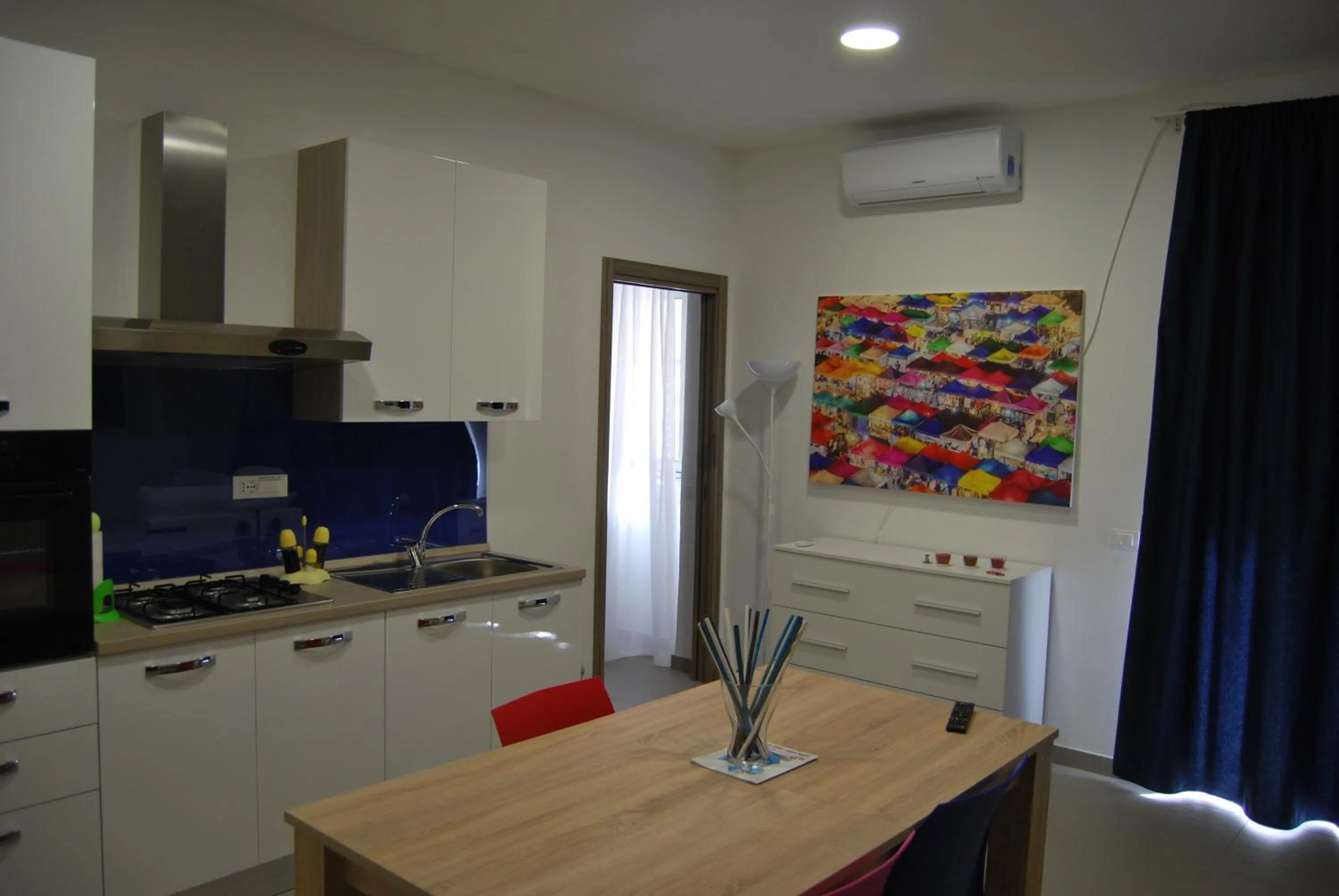 Kitchen or kitchenette in Residence Palazzo dei Delfini by RECEPTIO