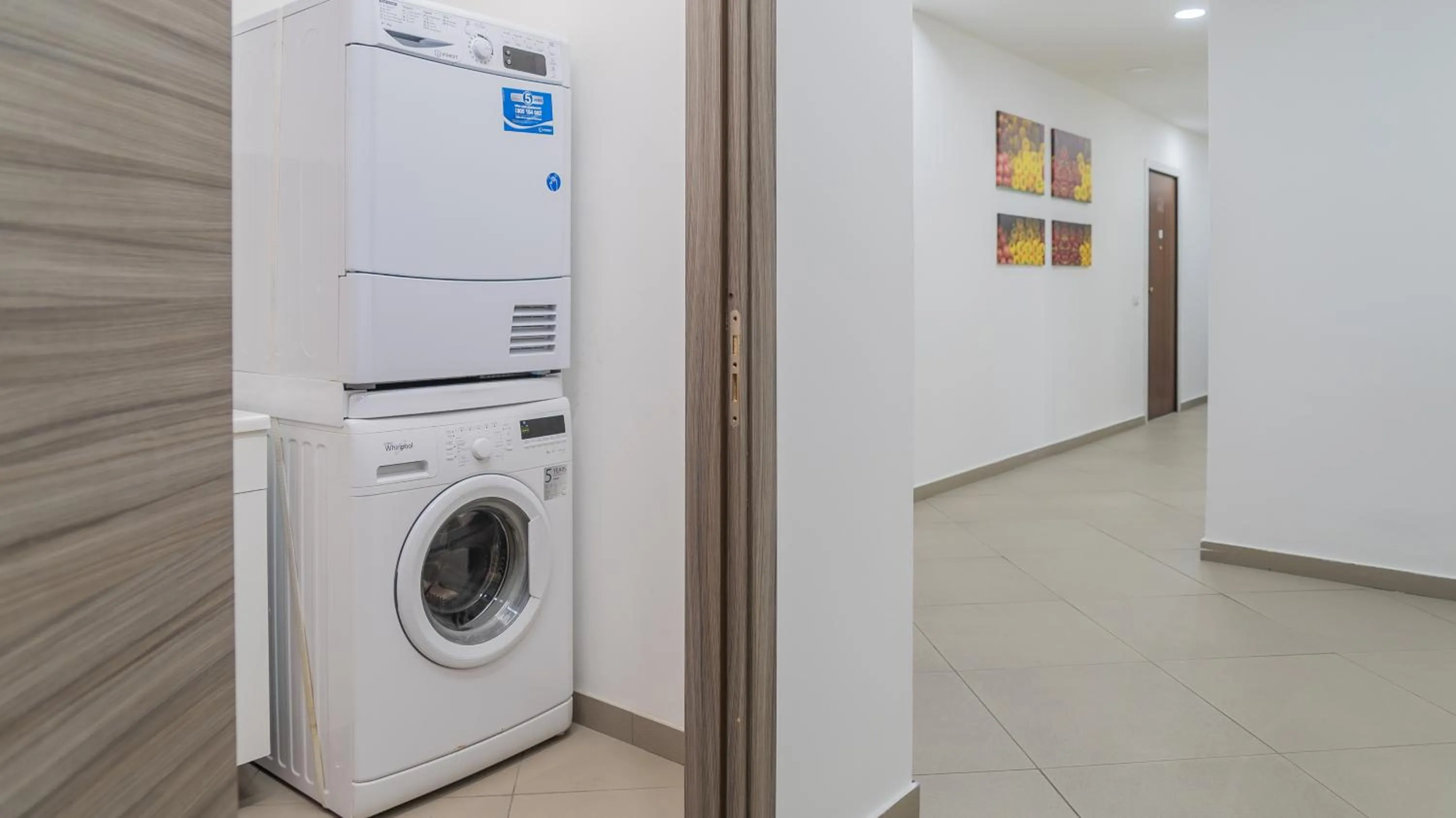 washing machine in Residence Palazzo dei Delfini by RECEPTIO