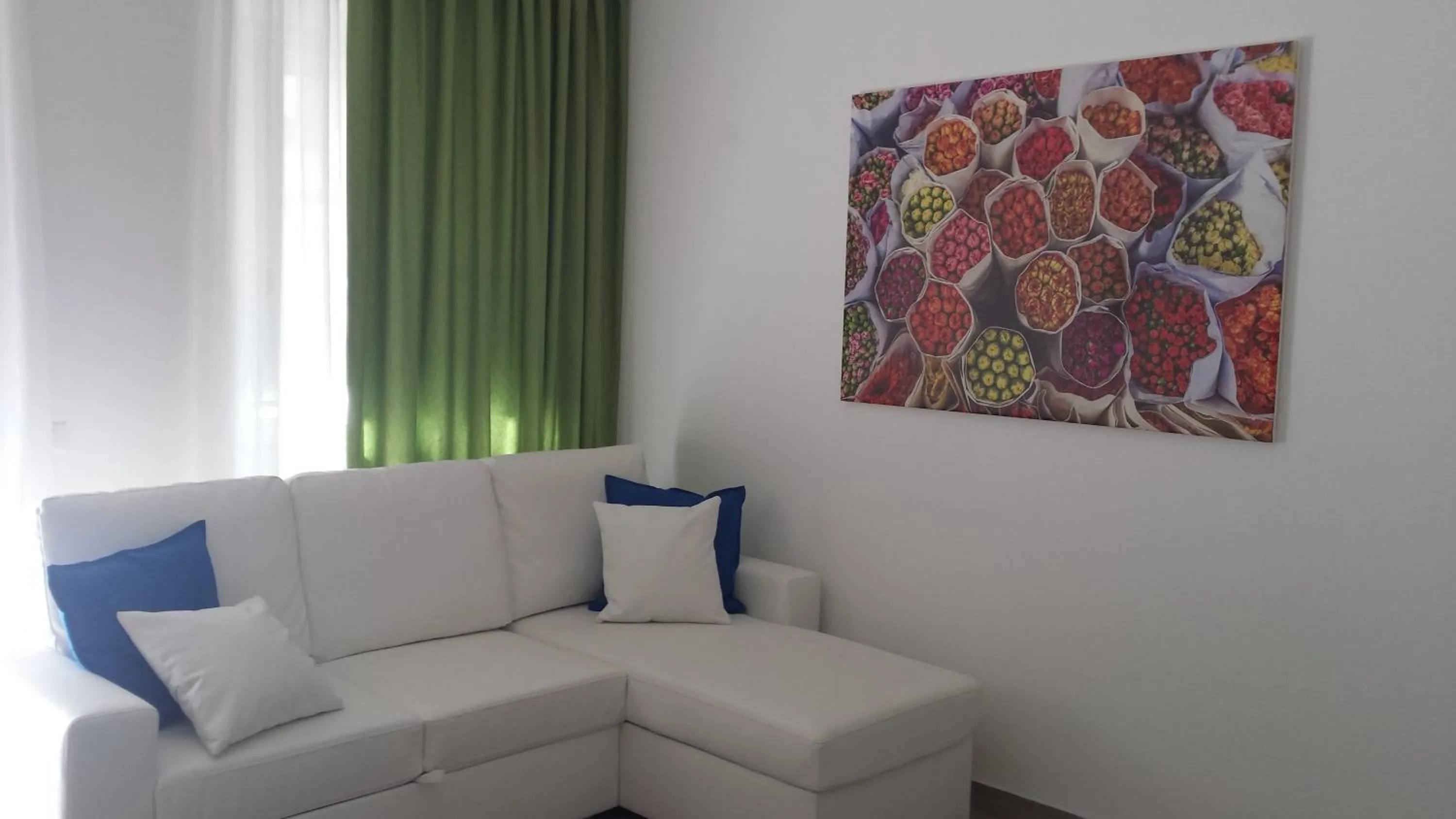 Living room in Residence Palazzo dei Delfini by RECEPTIO