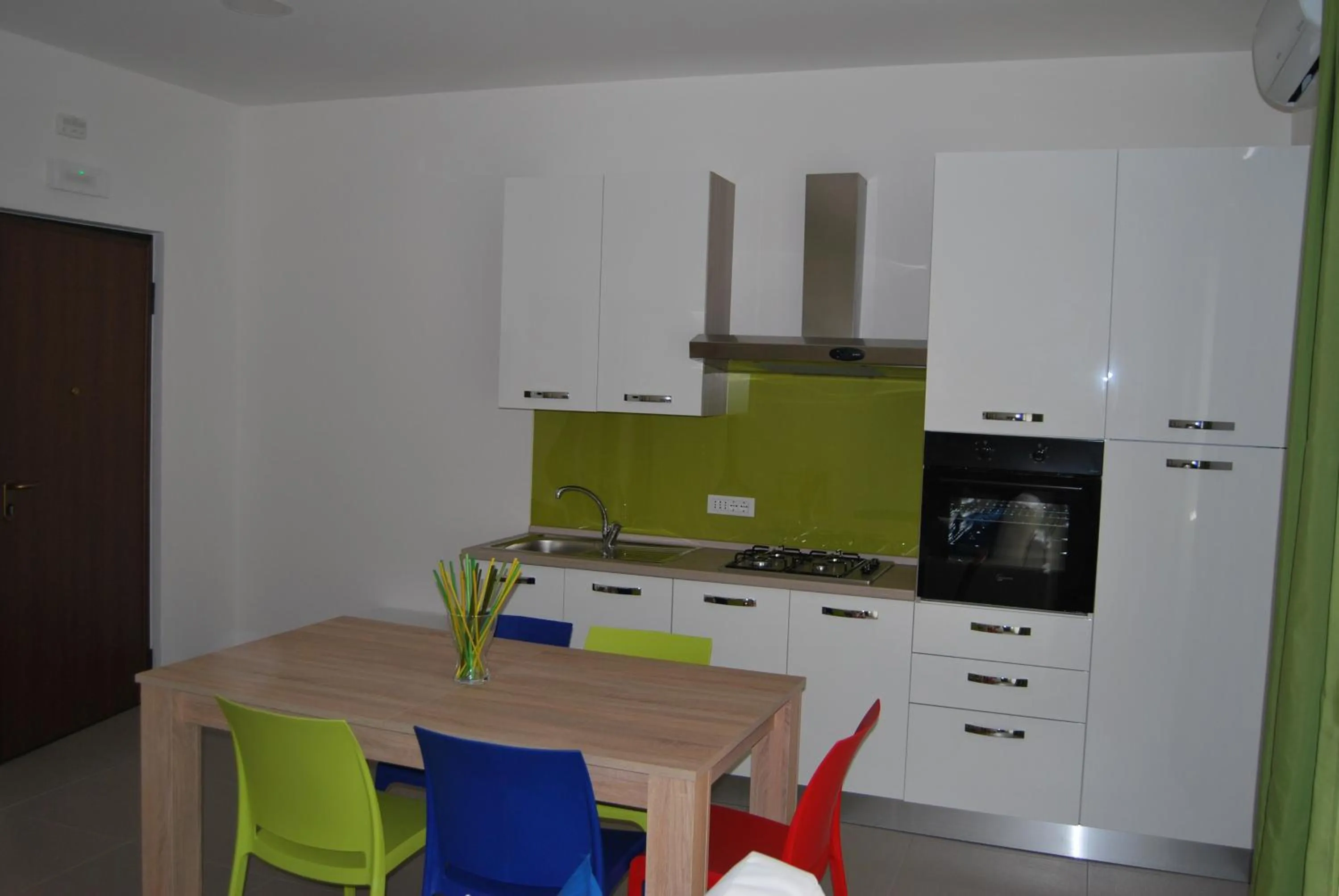 Kitchen or kitchenette in Residence Palazzo dei Delfini by RECEPTIO