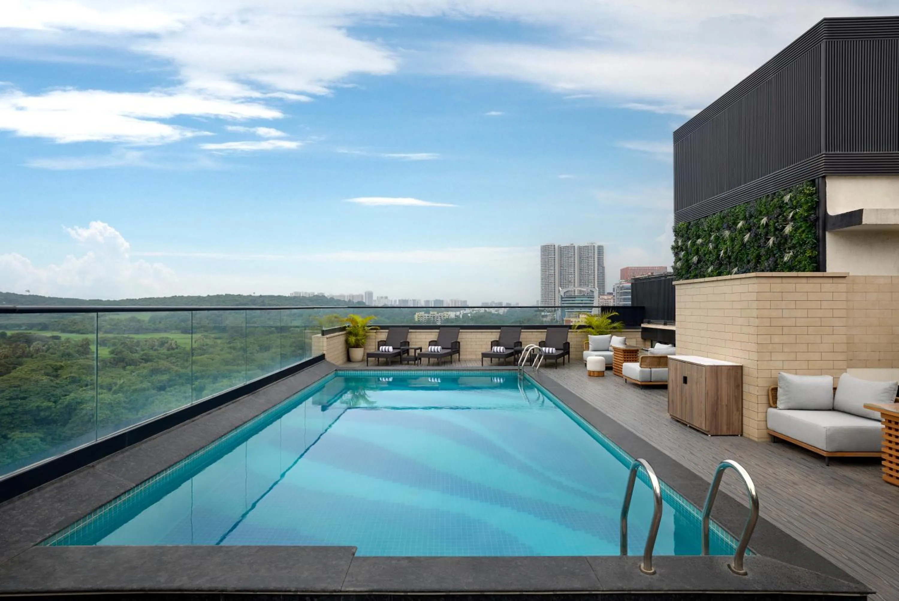 Swimming pool in The Fern Mumbai, Goregaon, Series by Marriott