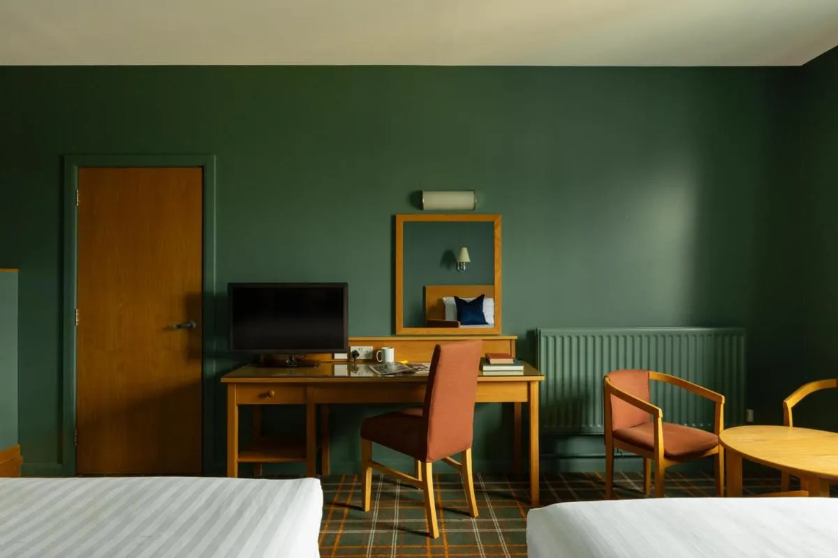 Seating area, Bed in Portrush Atlantic Hotel