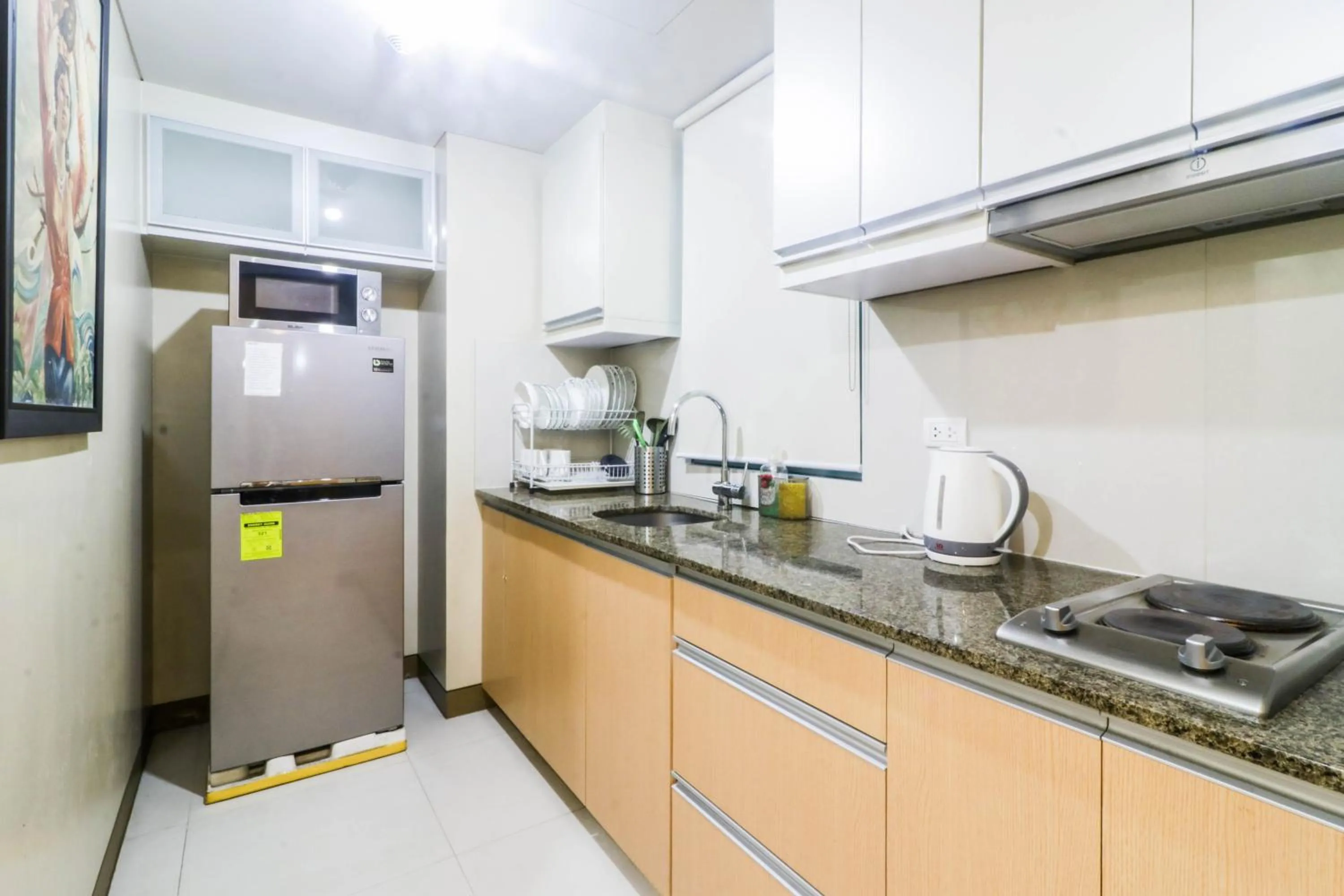 Kitchen or kitchenette in PRS at One Palm Tree Villa near T3 Airport