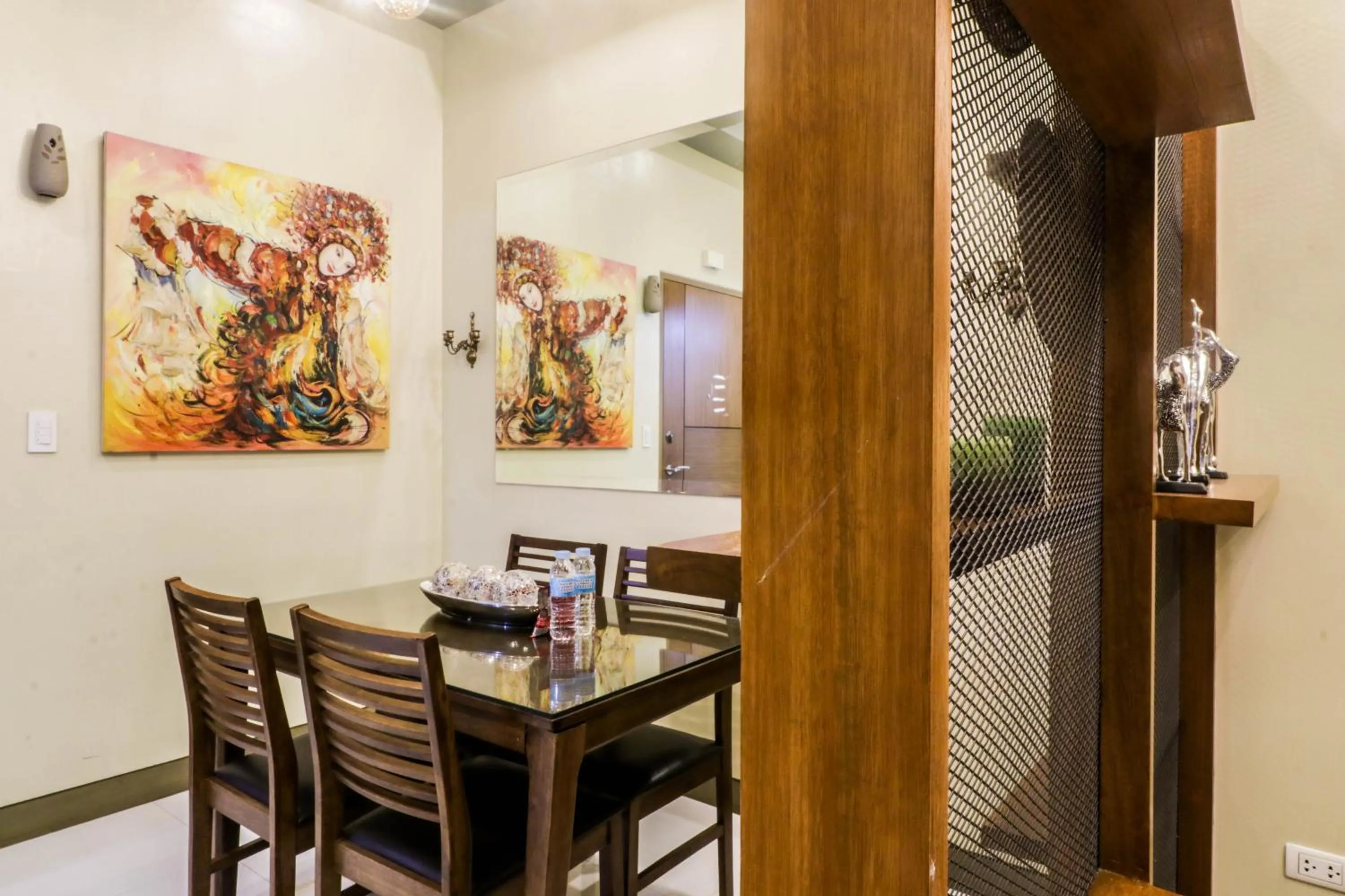 Dining area in PRS at One Palm Tree Villa near T3 Airport