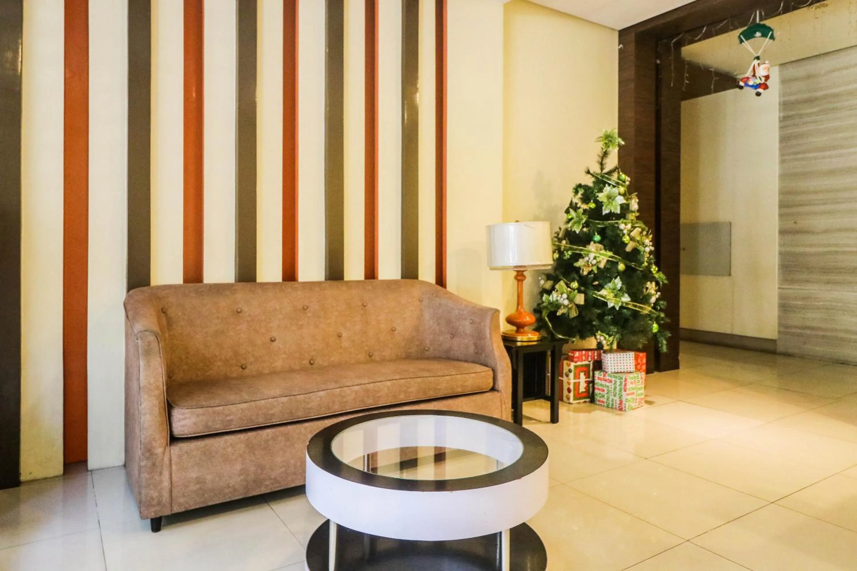 Seating area in PRS at One Palm Tree Villa near T3 Airport