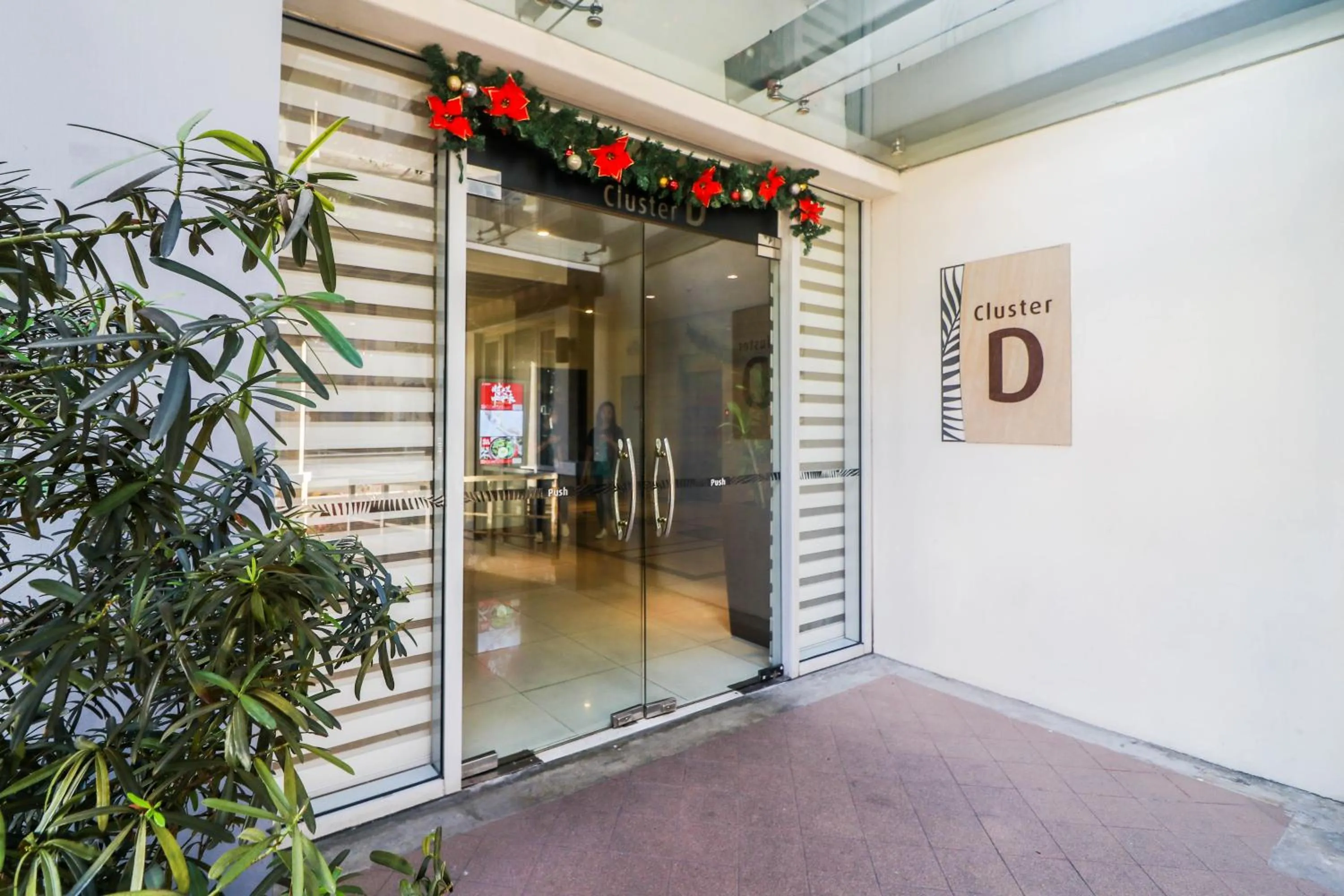 Facade/entrance in PRS at One Palm Tree Villa near T3 Airport