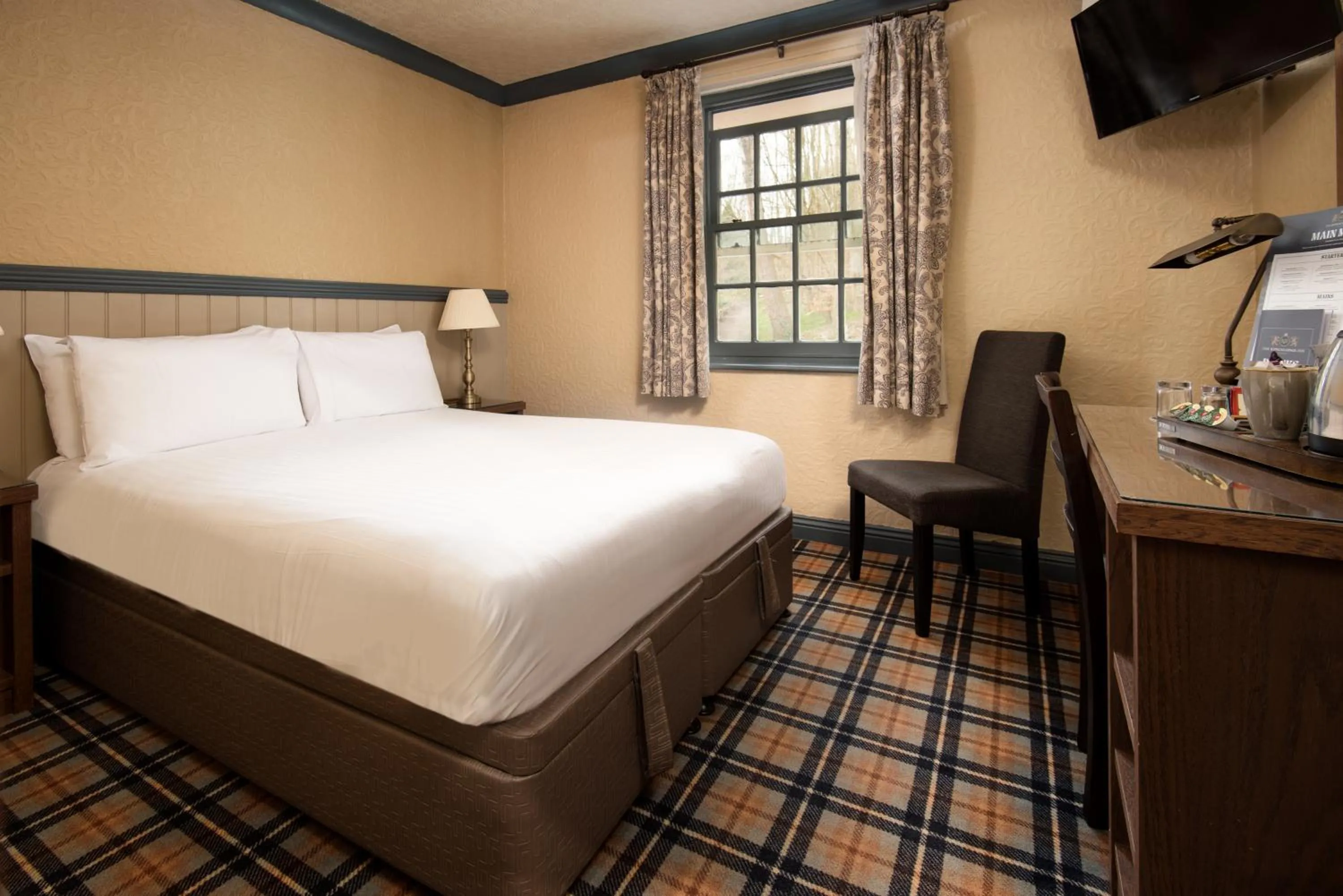 Bed in The Kingslodge Inn - The Inn Collection Group