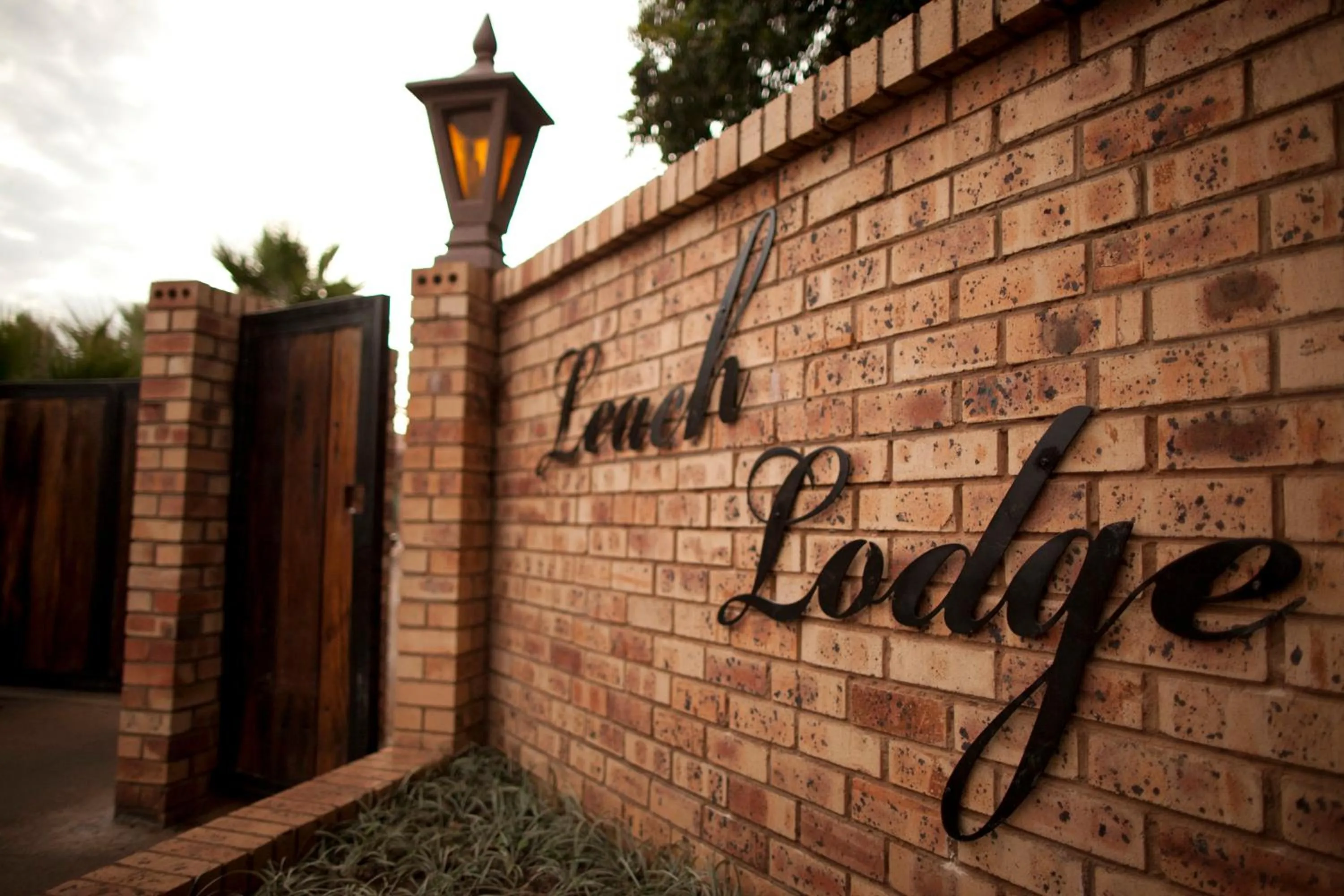 Property logo or sign in Leach Lodge