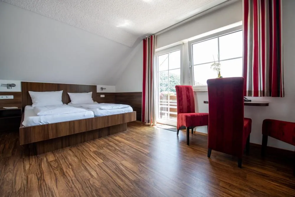 Bed in Garni Hotel Henn